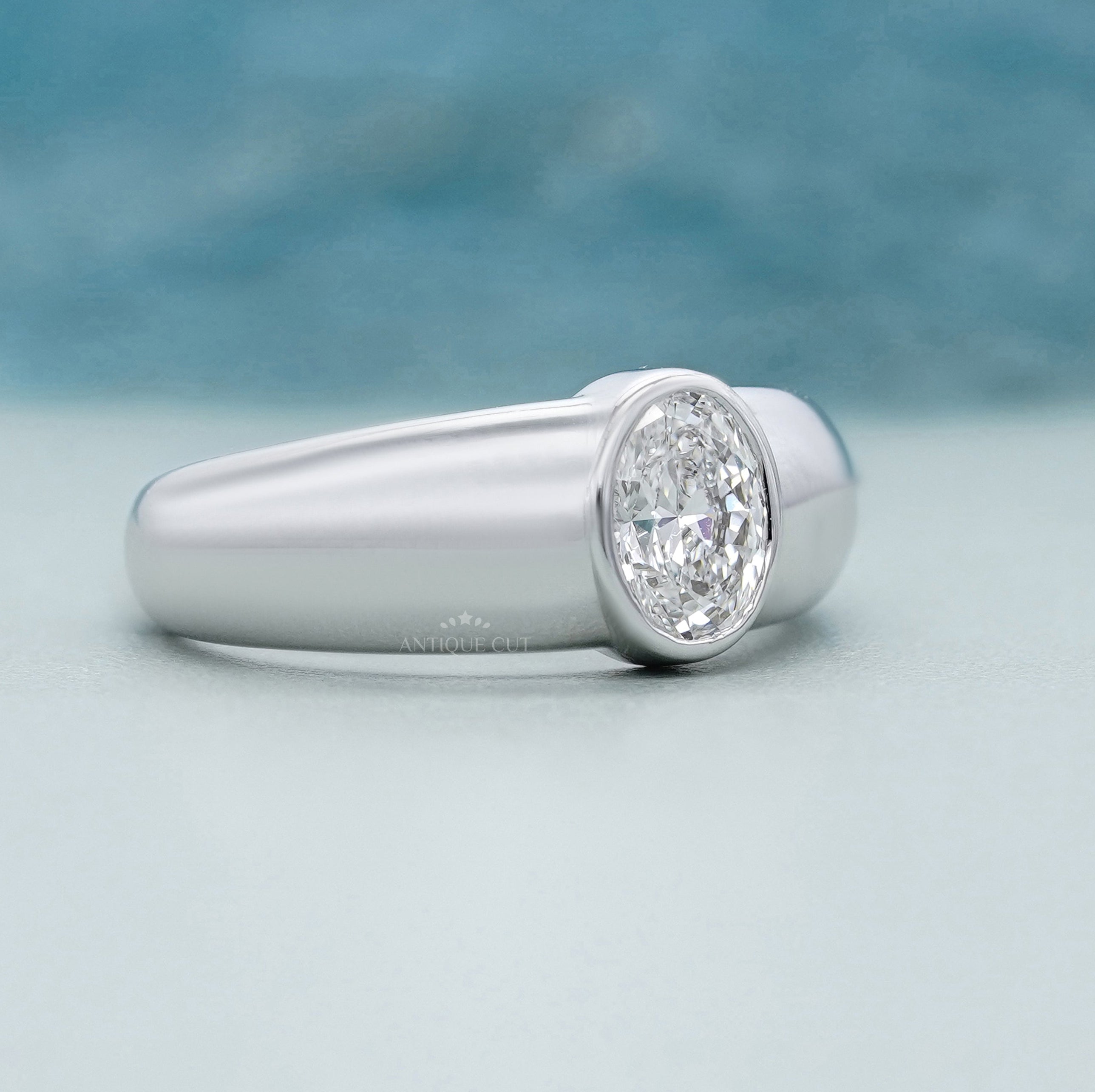 Modern solitaire oval diamond engagement ring