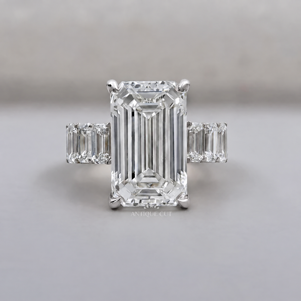 9.0 Carat Lab Grown Emerald Cut Engagement Ring with Tapered Side Stones