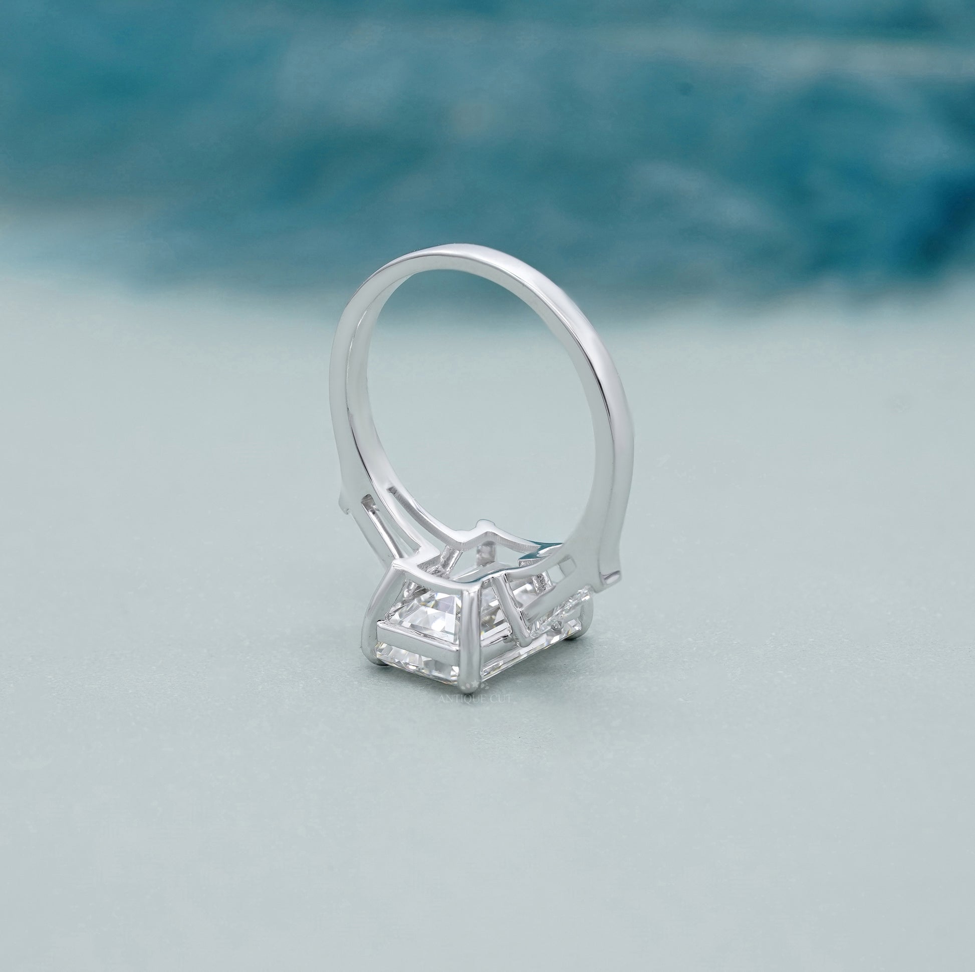 Emerald Cut 5.60tcw Lab Grown Diamond Three Stone Engagement Ring | Baguette Side Stones | Platinum/White Gold | IGI Certified