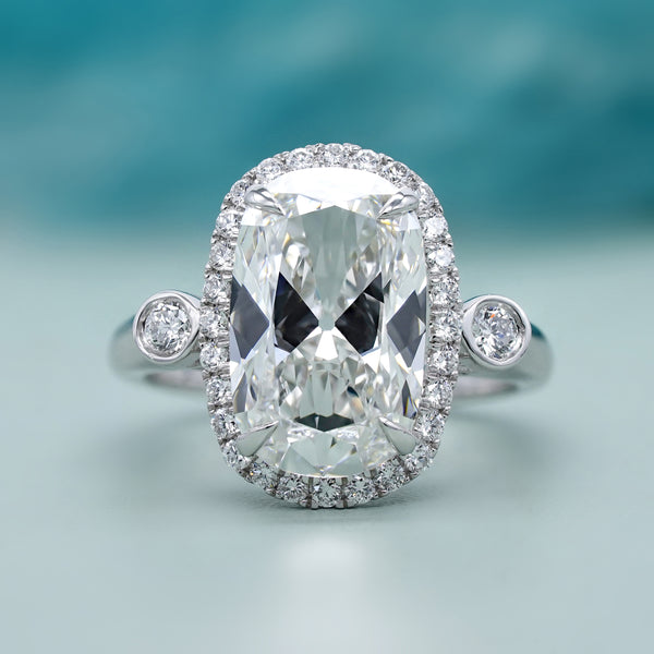 Old Mine Cut Elongated Cushion Engagement Ring With Halo Setting
