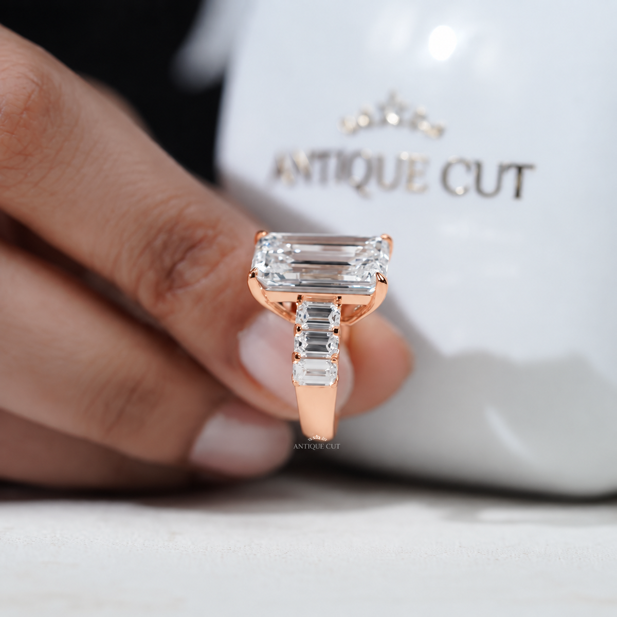 9.0 Carat Lab Grown Emerald Cut Engagement Ring with Tapered Side Stones