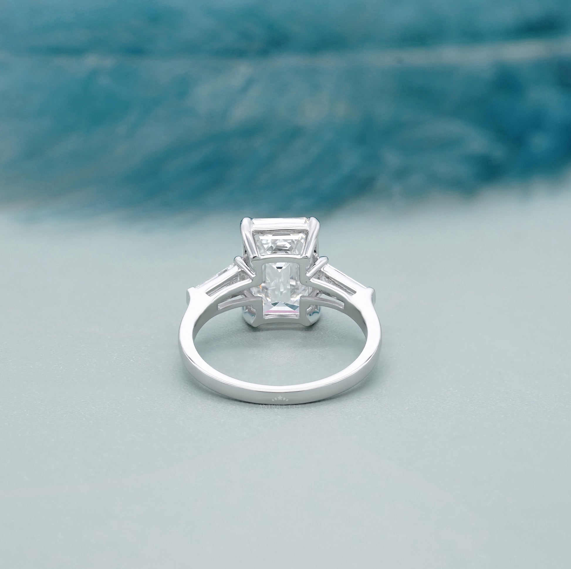 Emerald Cut 5.60tcw Lab Grown Diamond Three Stone Engagement Ring | Baguette Side Stones | Platinum/White Gold | IGI Certified