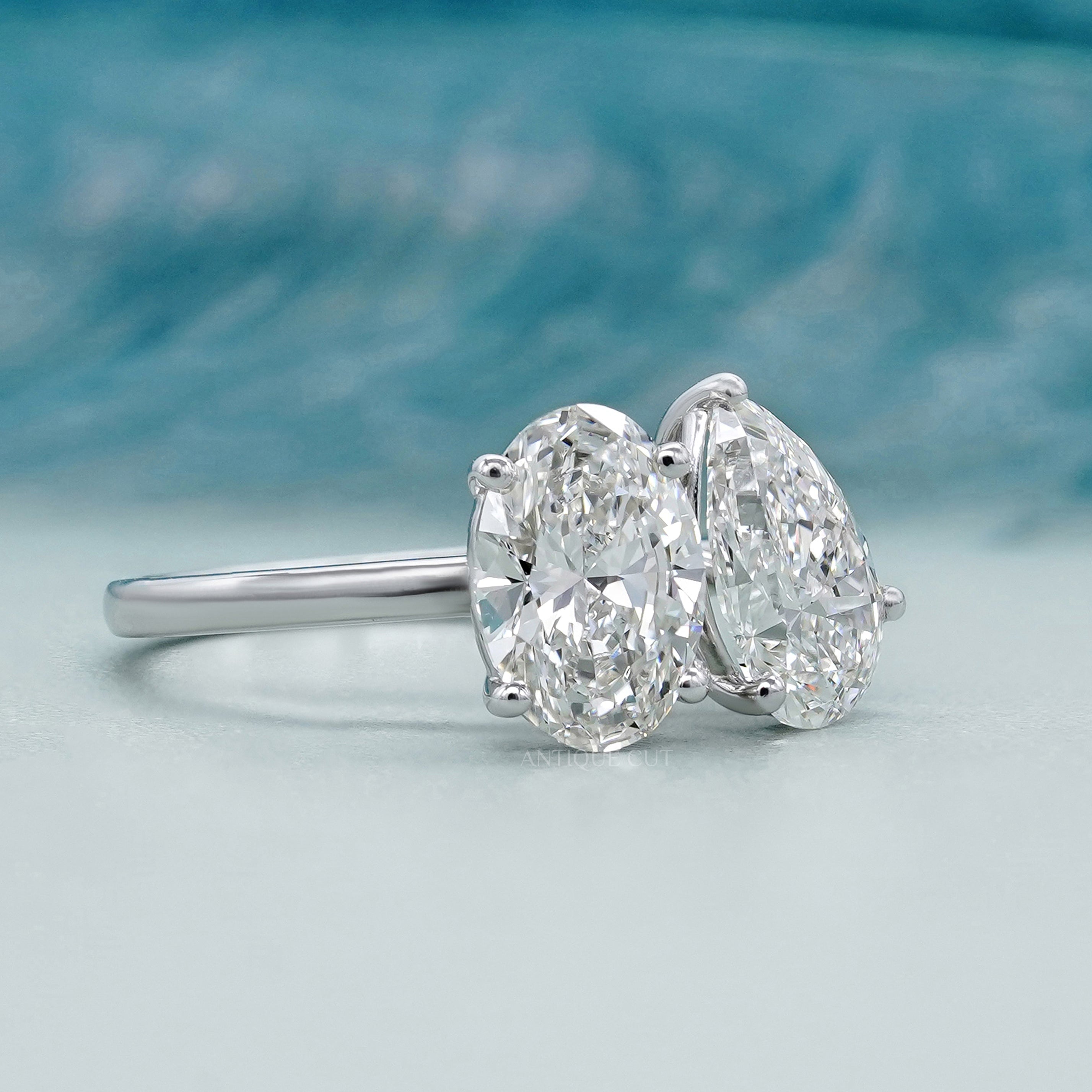 White gold oval and pear lab grown diamond ring