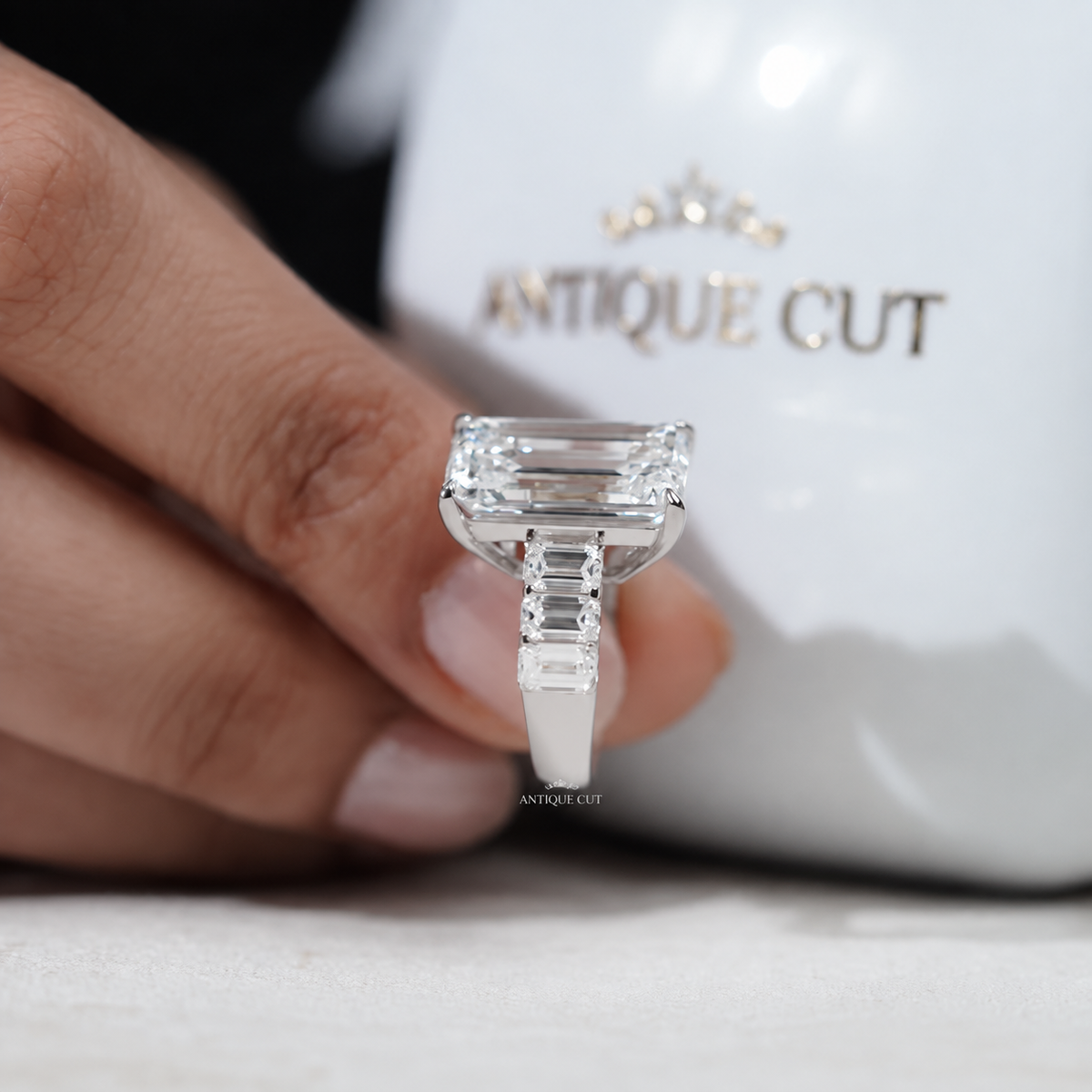 9.0 Carat Lab Grown Emerald Cut Engagement Ring with Tapered Side Stones