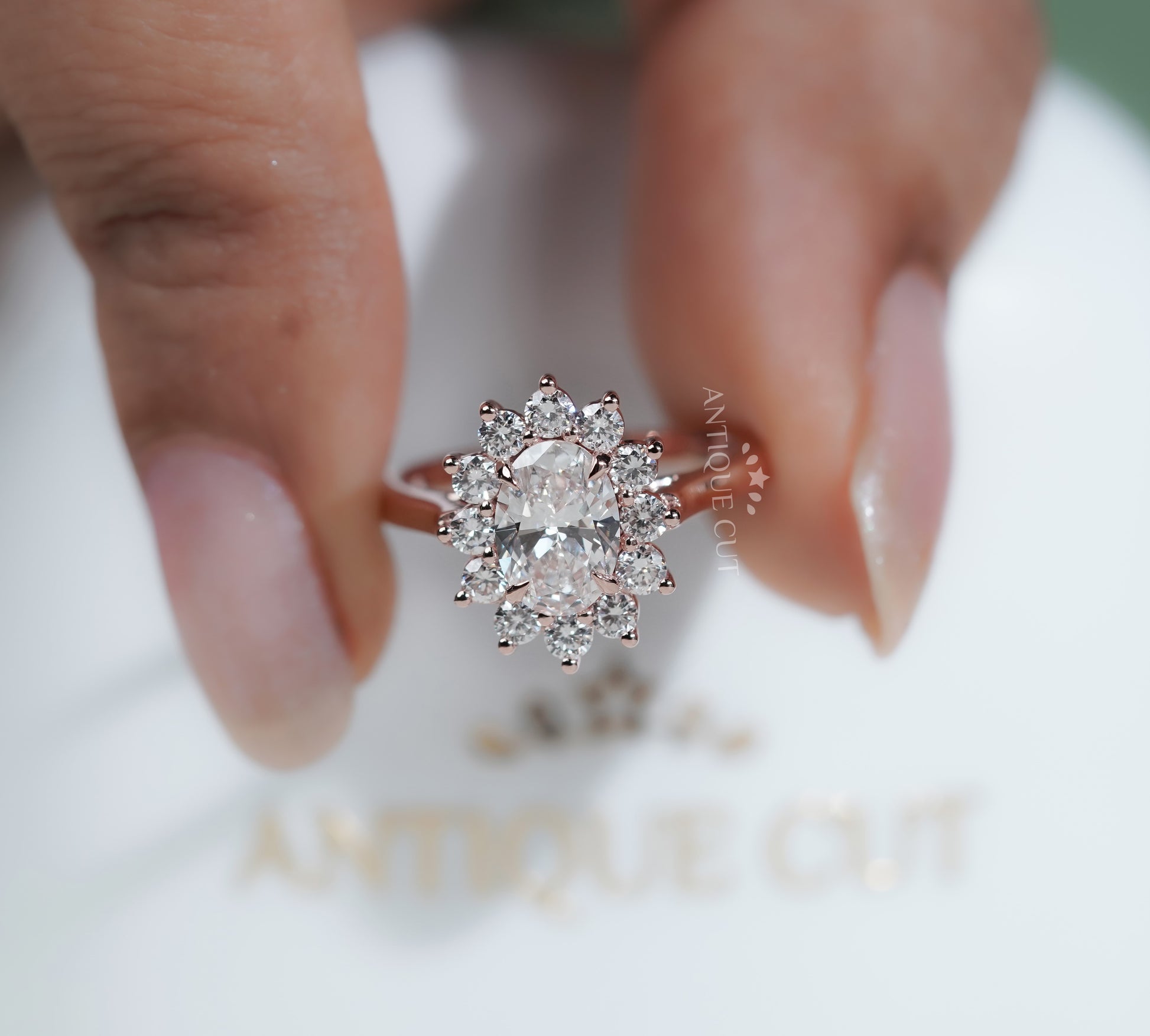 Oval Rose Gold Halo Engagement Ring With Floral Style Round Diamond Accent | IGI Certified