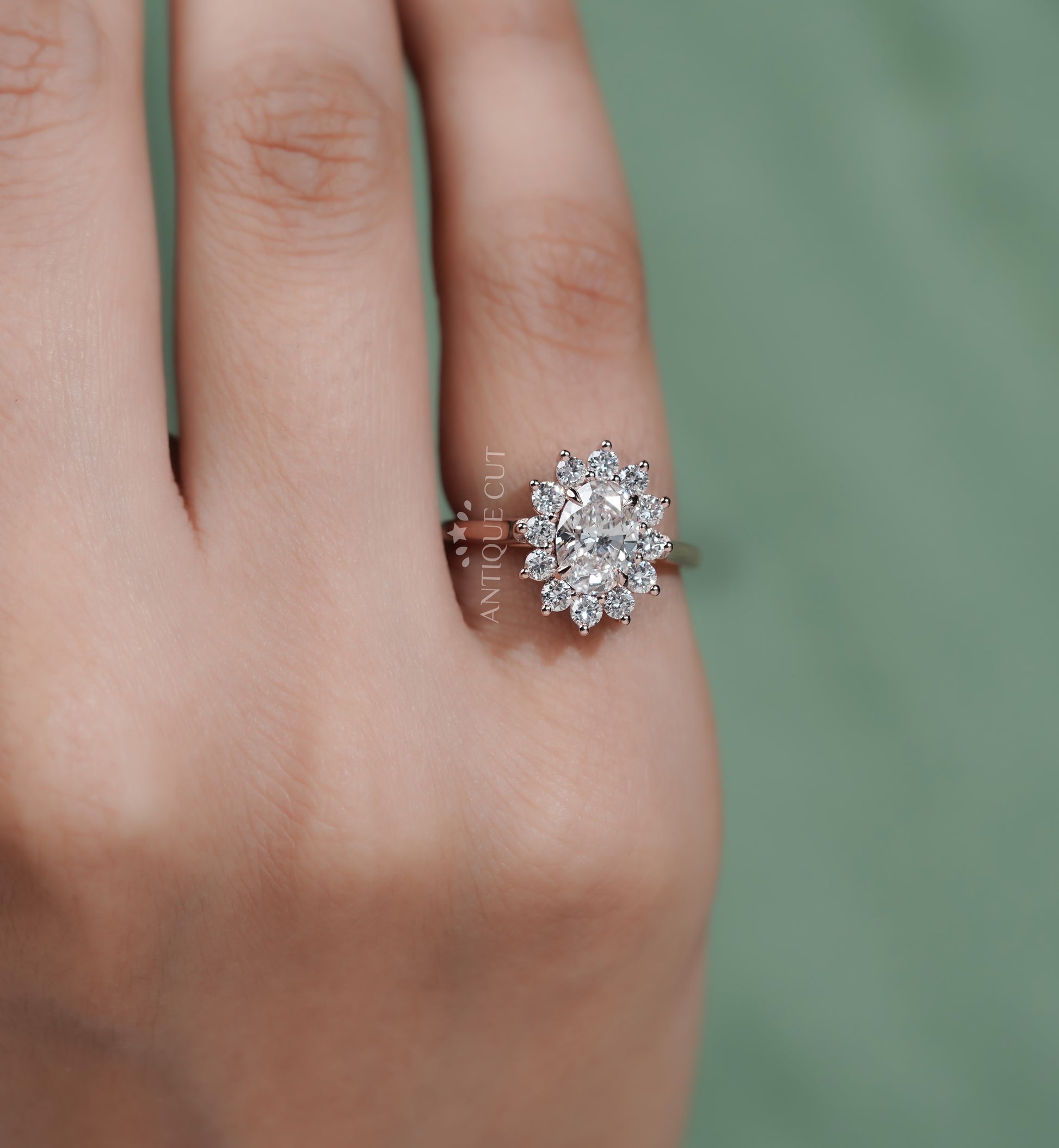 Oval Rose Gold Halo Engagement Ring With Floral Style Round Diamond Accent | IGI Certified