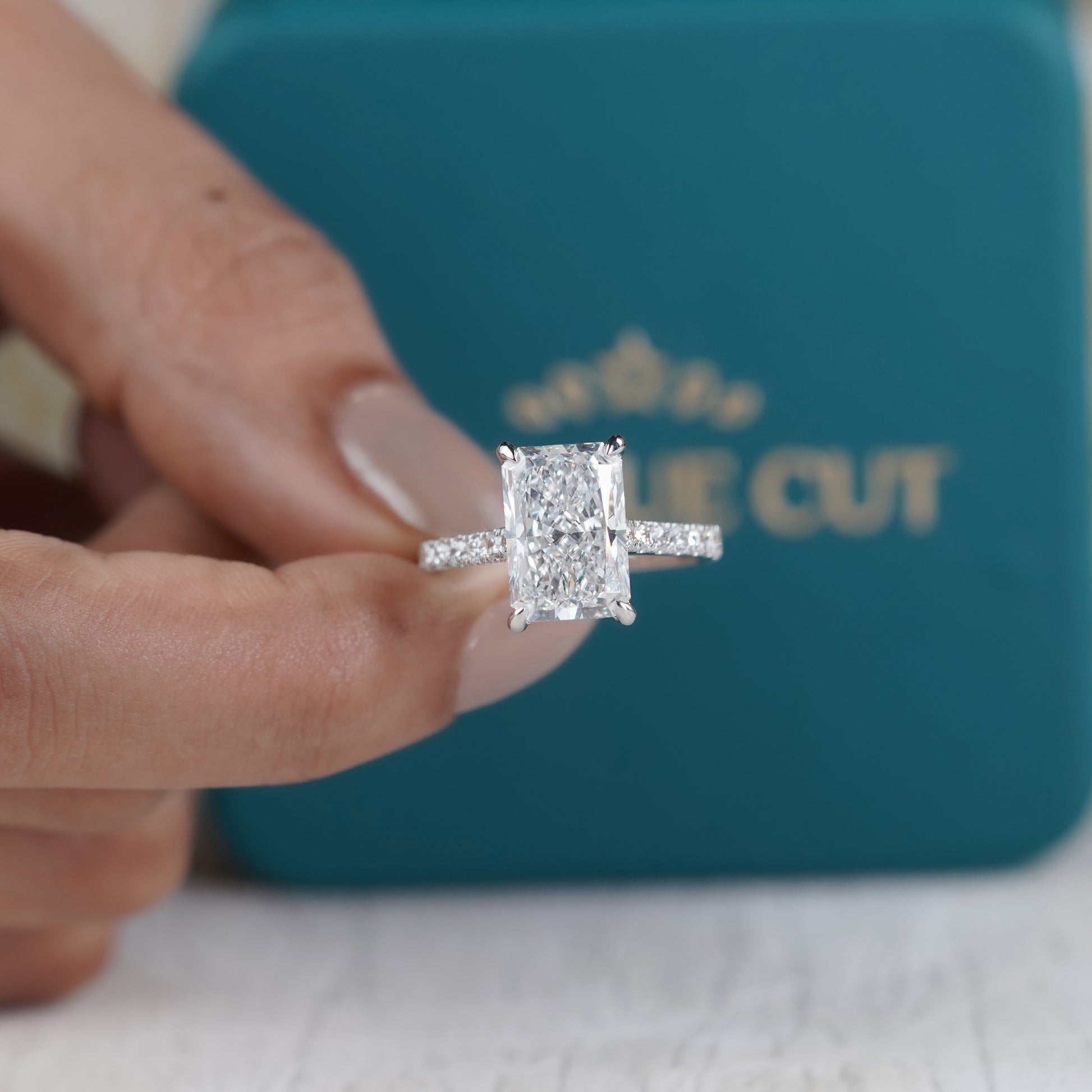 Radiant Cut 5.70tcw Lab Grown Diamond Engagement Ring | Hidden Halo Pavé Band | IGI Certified
