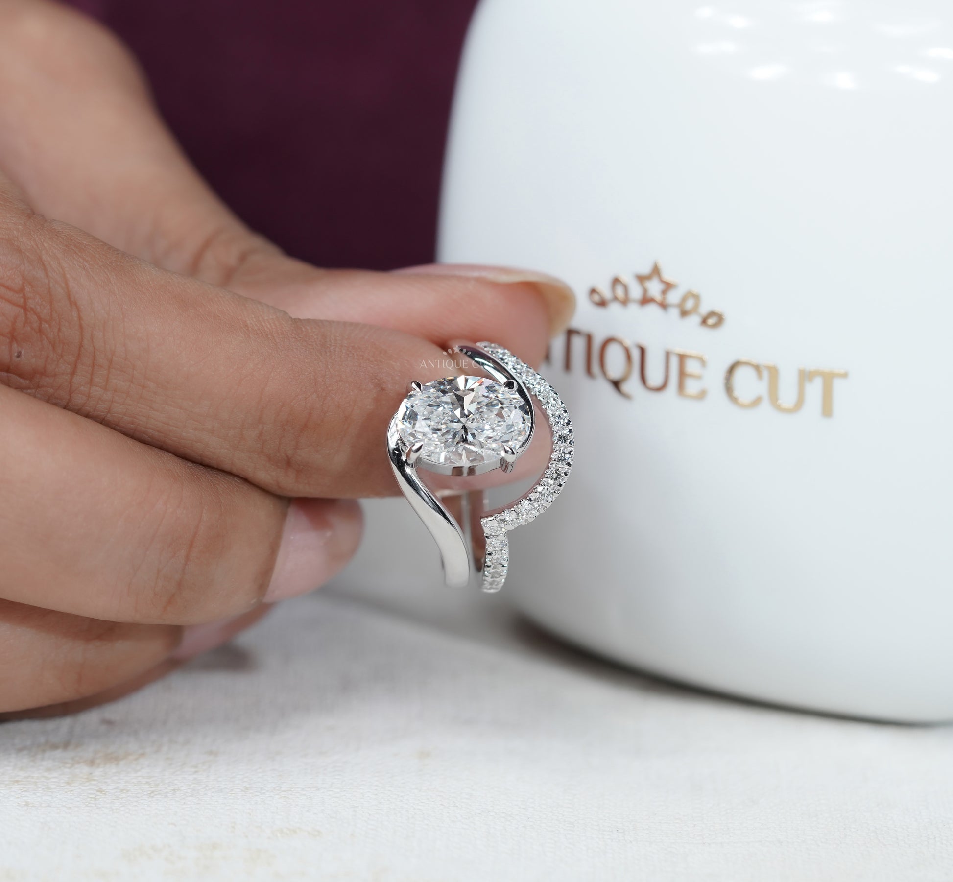 IGI-certified oval bypass engagement ring