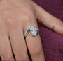 Oval diamond ring with claw prong setting and IGI certification