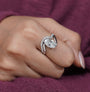 Antiquecut oval bypass engagement ring