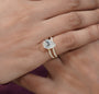 Pear diamond engagement ring with pave side stone details