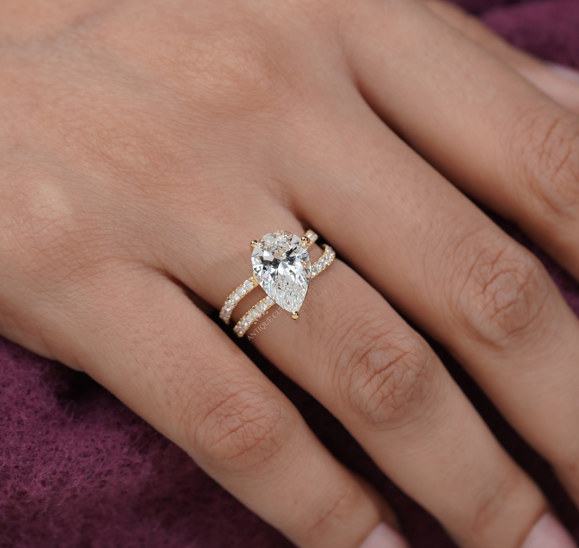 lab grown pear diamond ring in premium metal setting