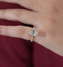 Claw prong oval diamond ring with shared-prong setting