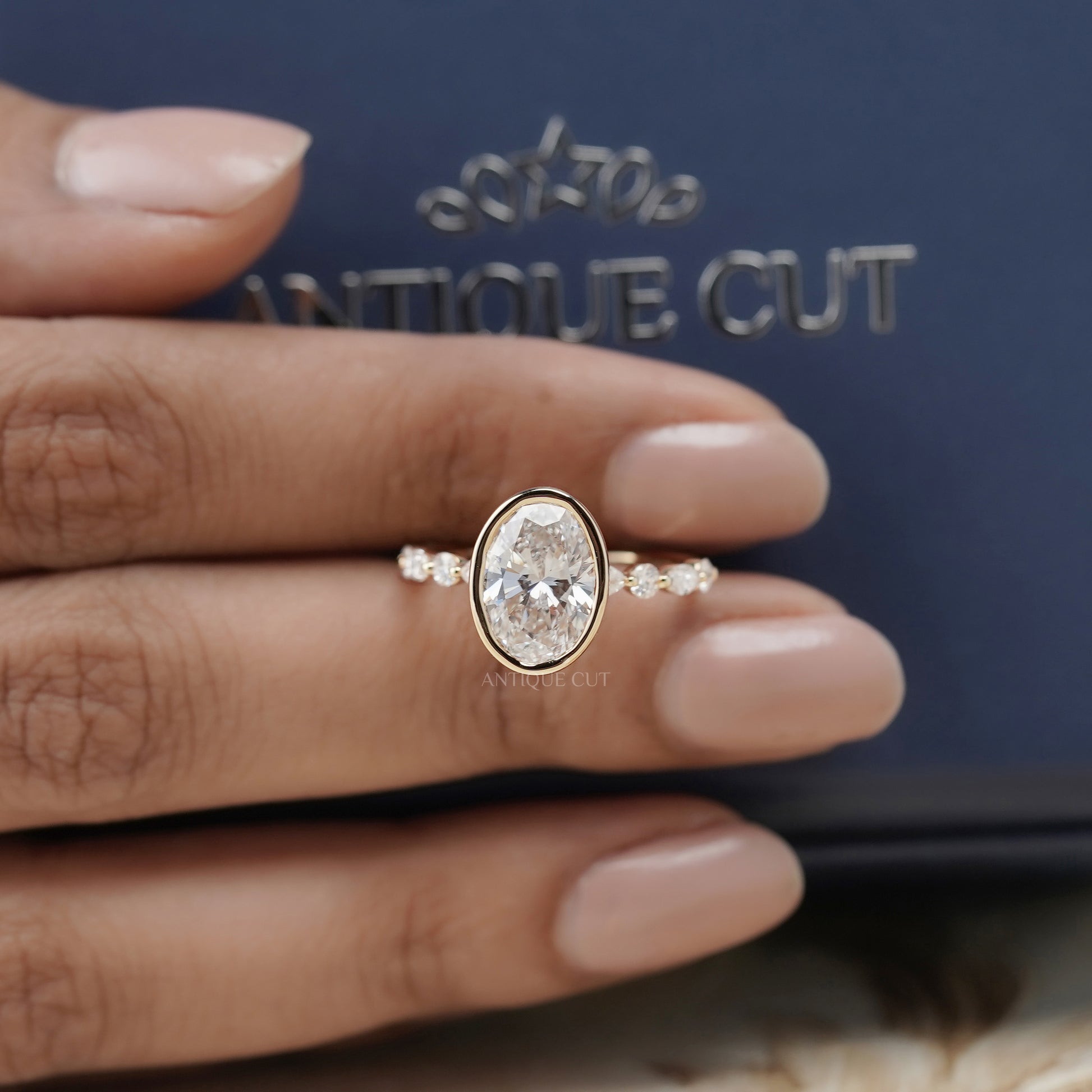 Oval 3.50tcw Bezel Set Lab Grown Diamond Engagement Ring | Yellow Gold with Side Stones | IGI Certified