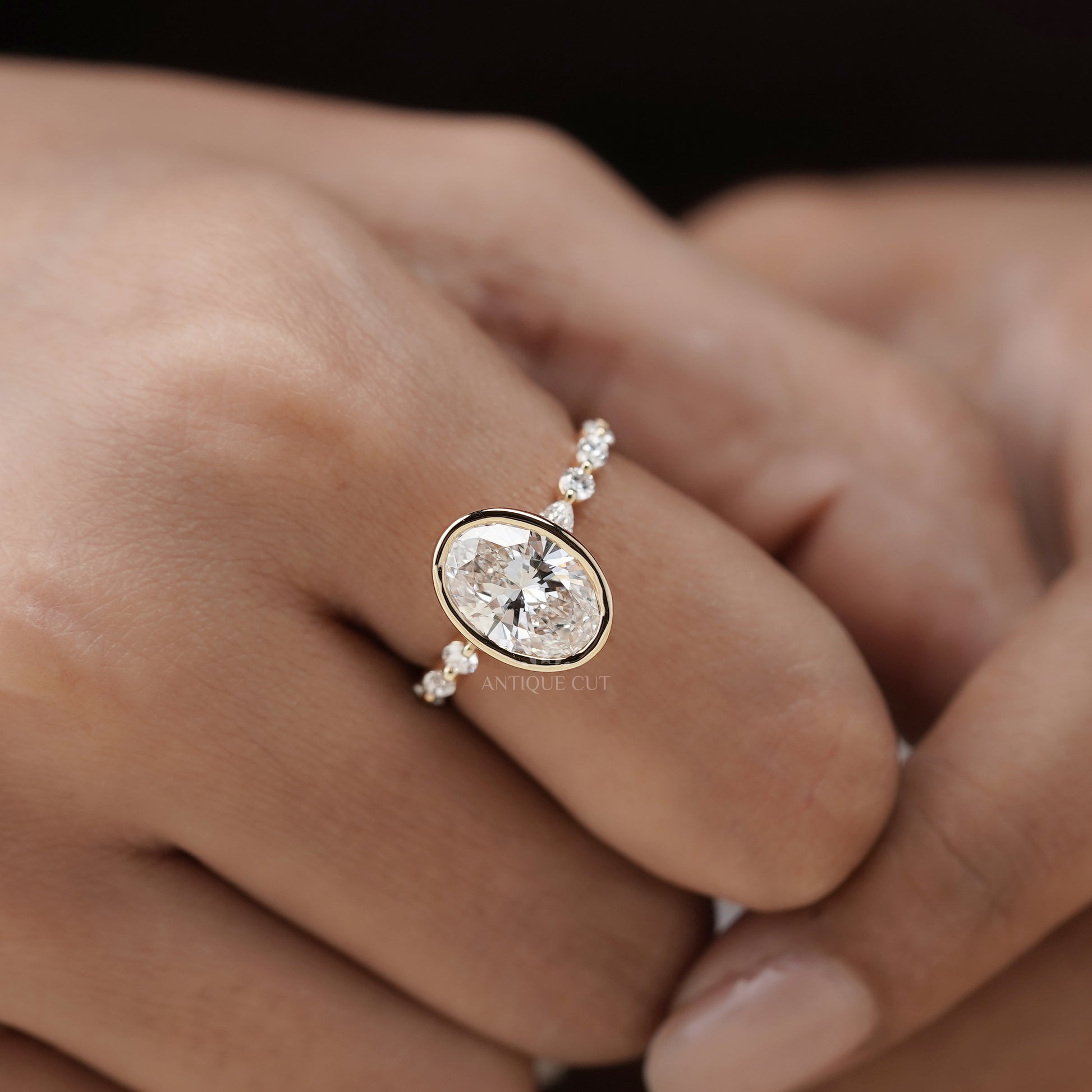 Oval 3.50tcw Bezel Set Lab Grown Diamond Engagement Ring | Yellow Gold with Side Stones | IGI Certified