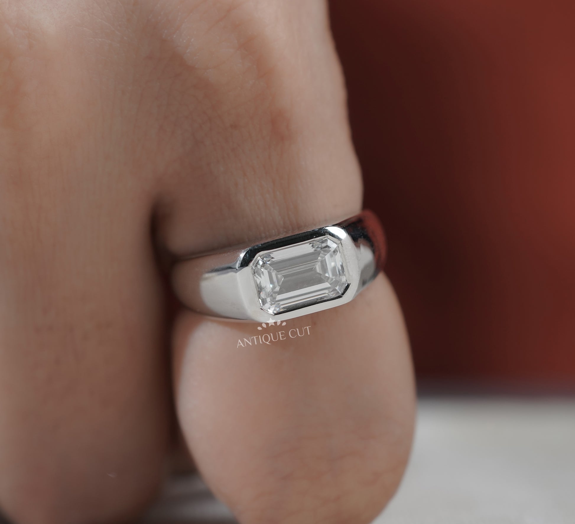 Emerald Cut East West Engagement Ring