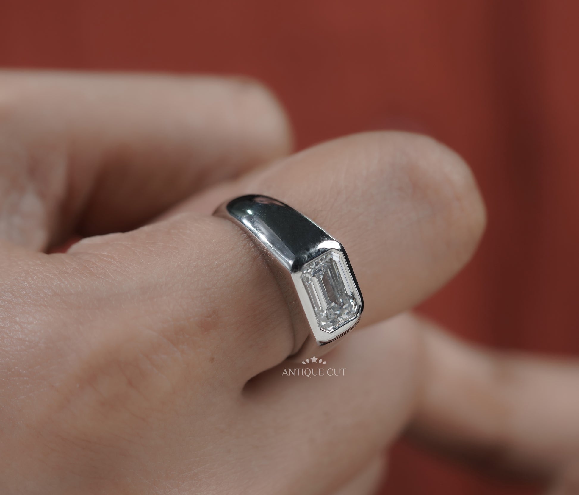 Emerald Cut East West Engagement Ring
