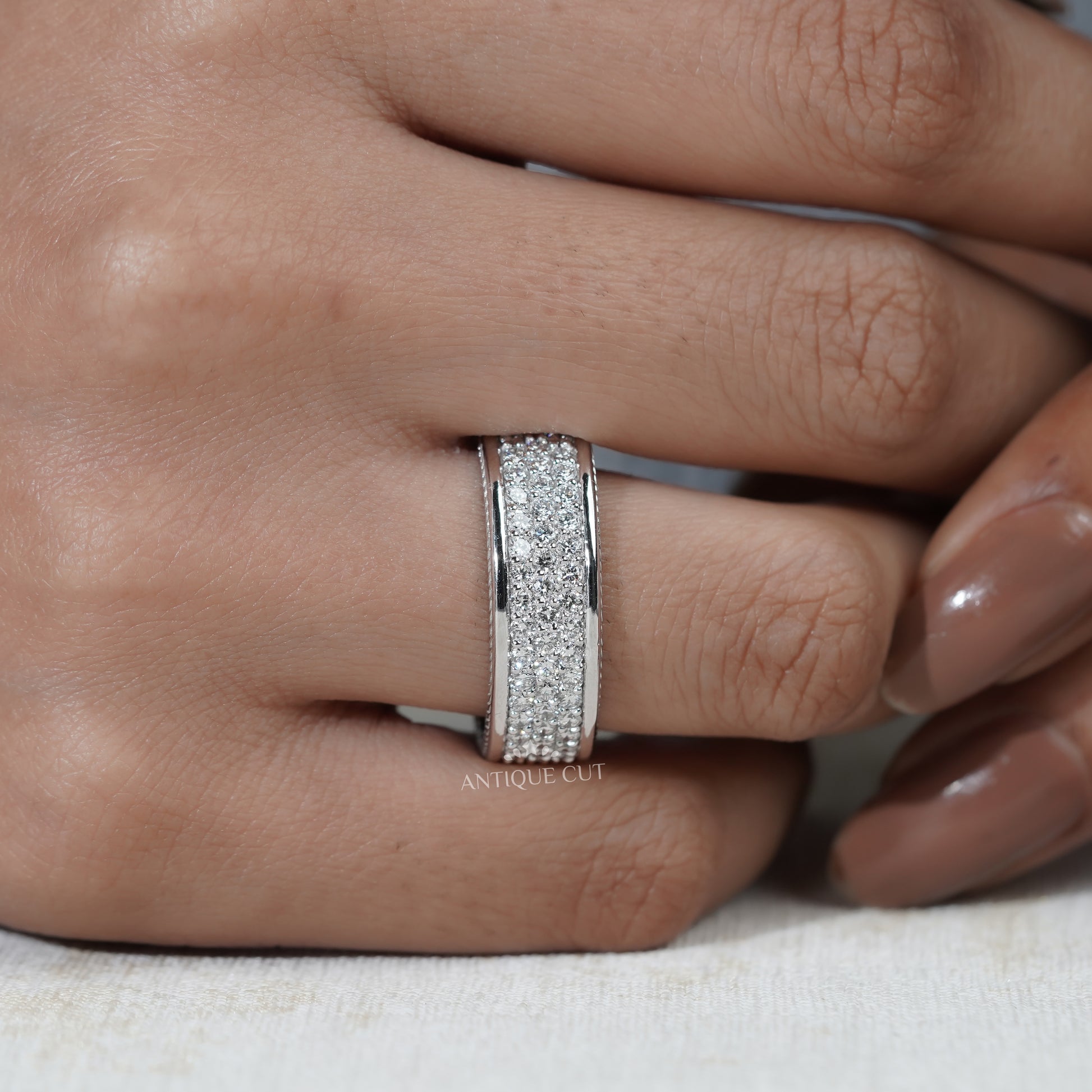 White gold wedding band with round diamonds
