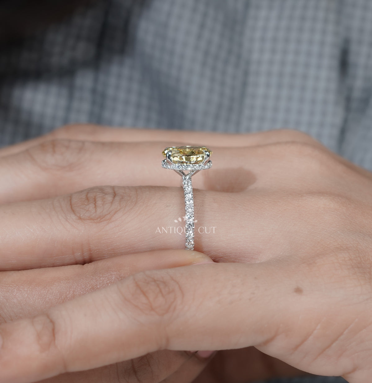 Lab-grown oval yellow diamond with hidden halo