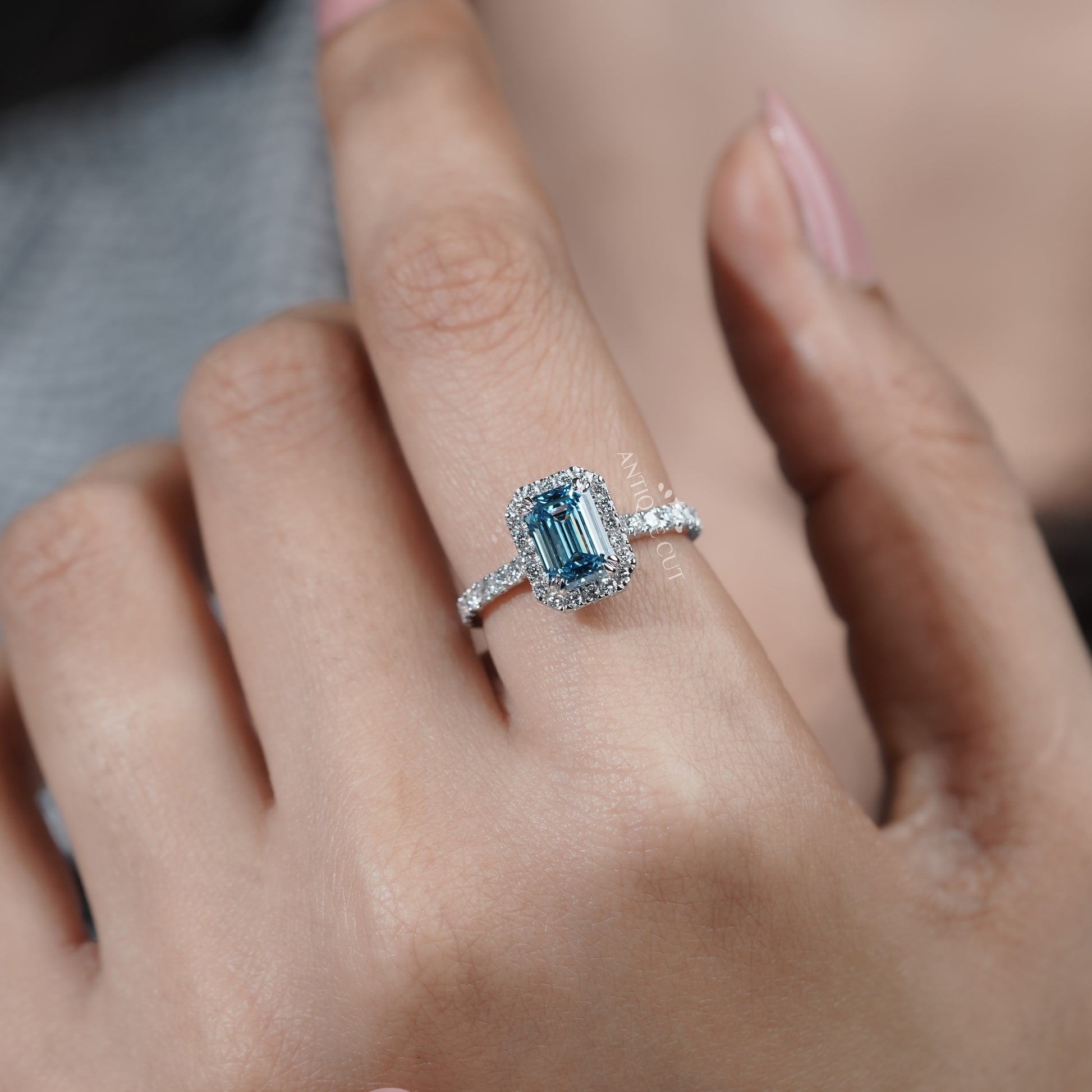 Fine jewelry fancy blue diamond ring emerald halo
