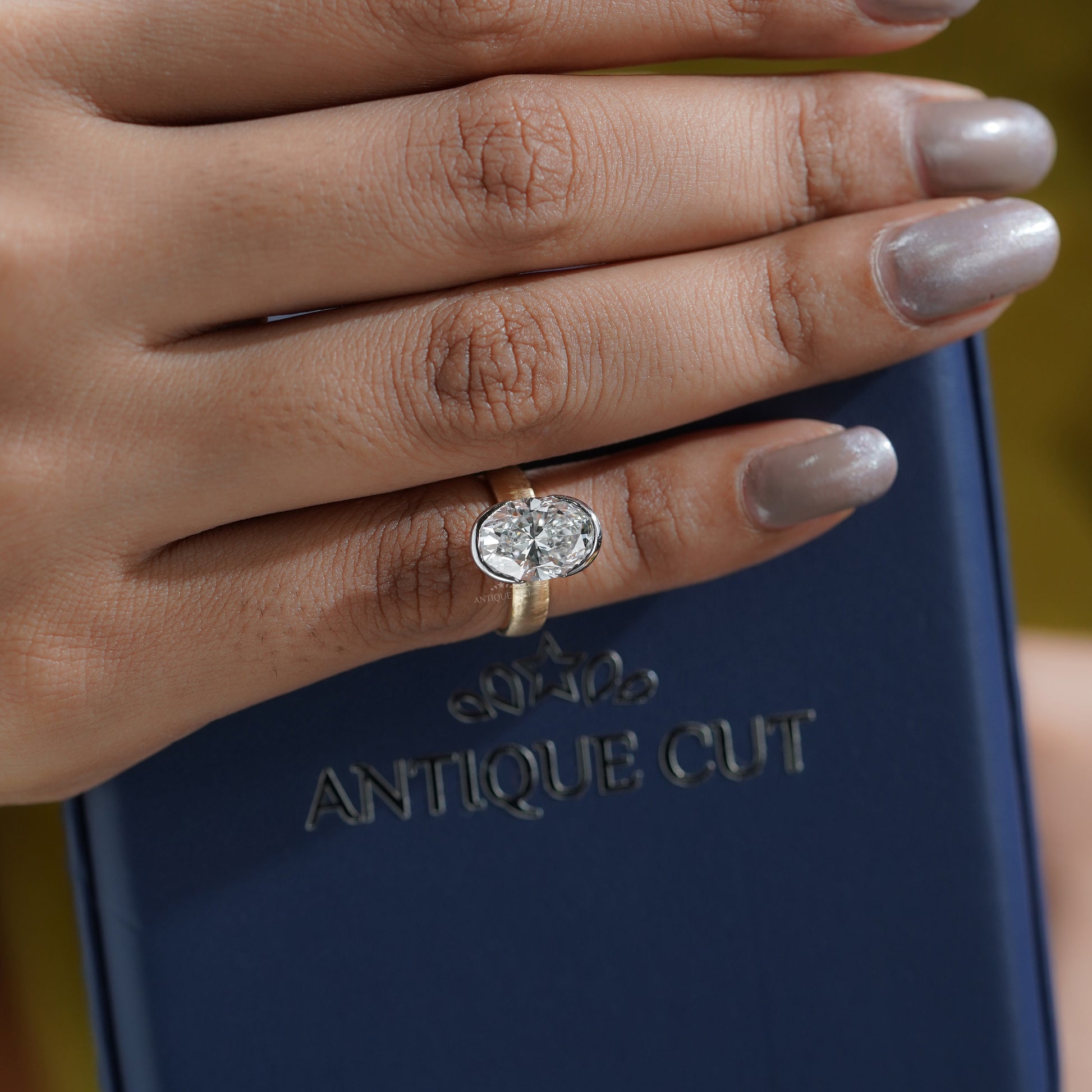 4ct Oval Lab Grown Diamond Bezel Engagement Ring | Two-Tone Matte Finish | IGI Certified D-E-F  VVS–VS