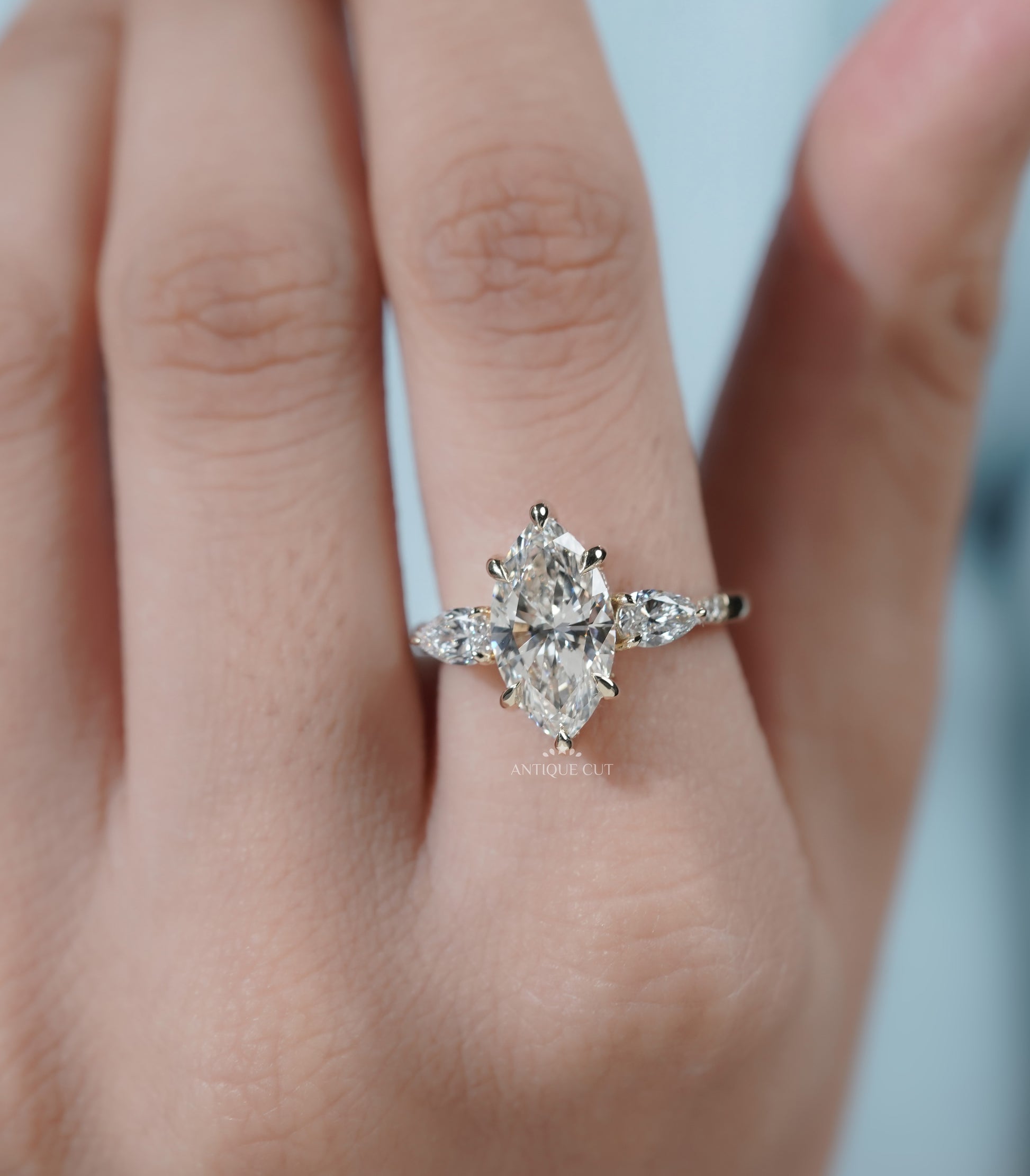 Marquise Cut Engagement Ring with Side Stones