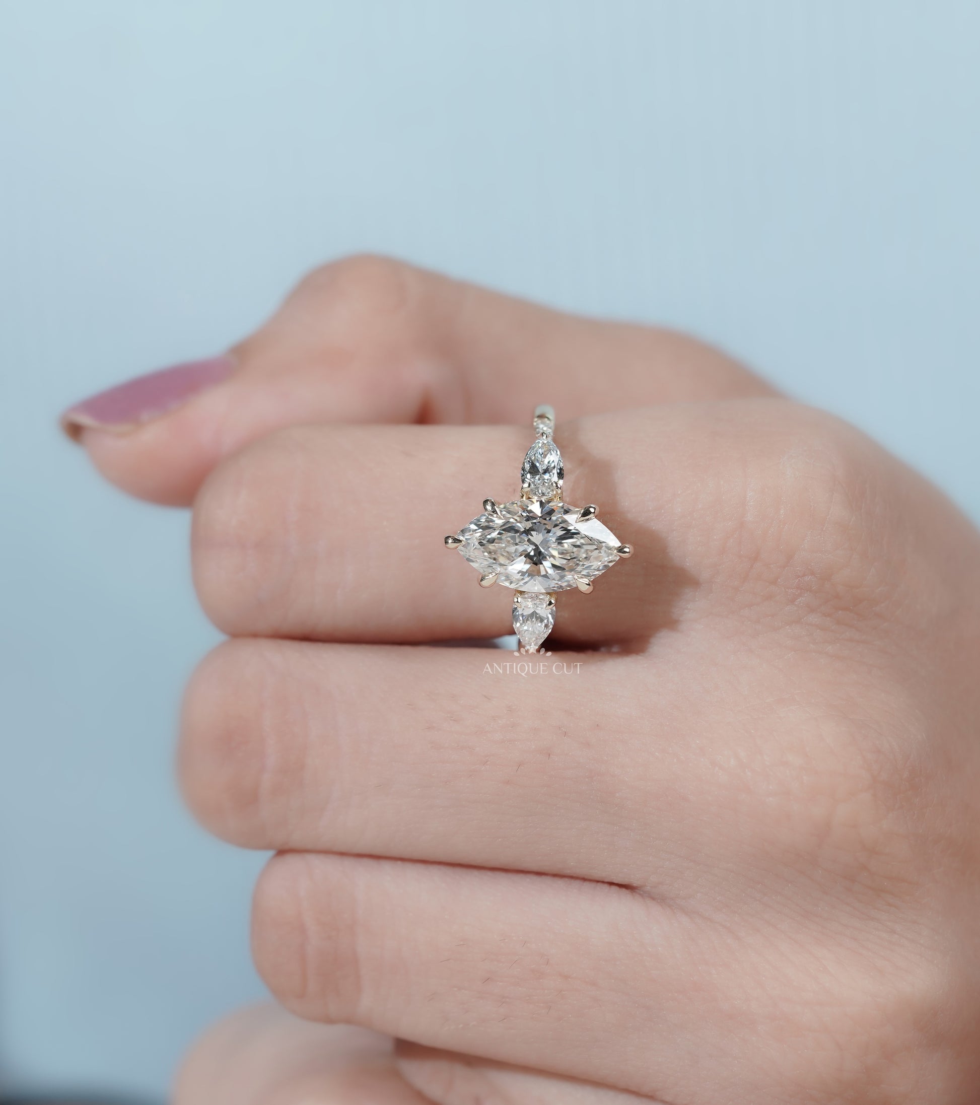 Marquise Cut Engagement Ring with Side Stones