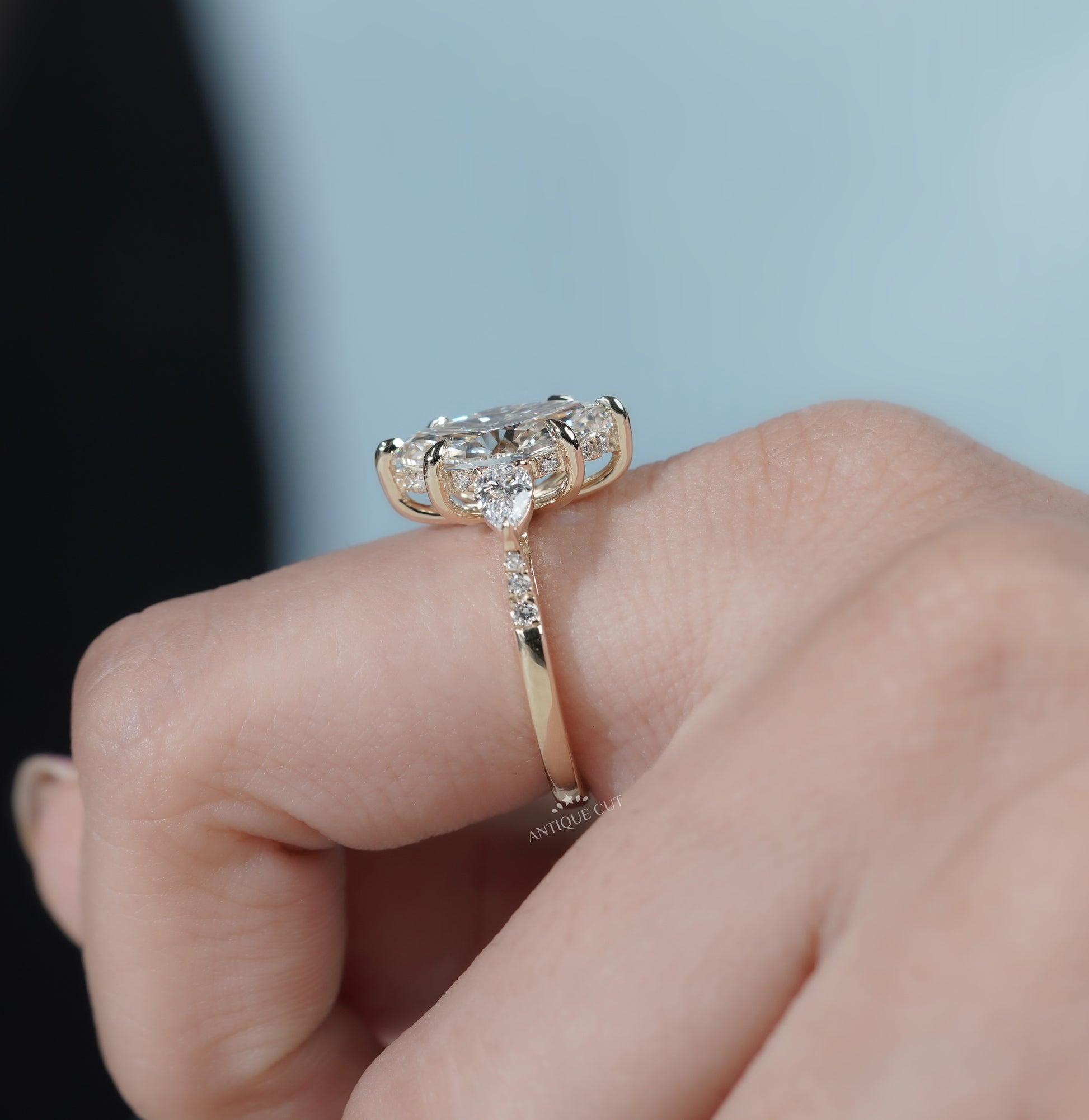 Marquise Cut Engagement Ring with Side Stones