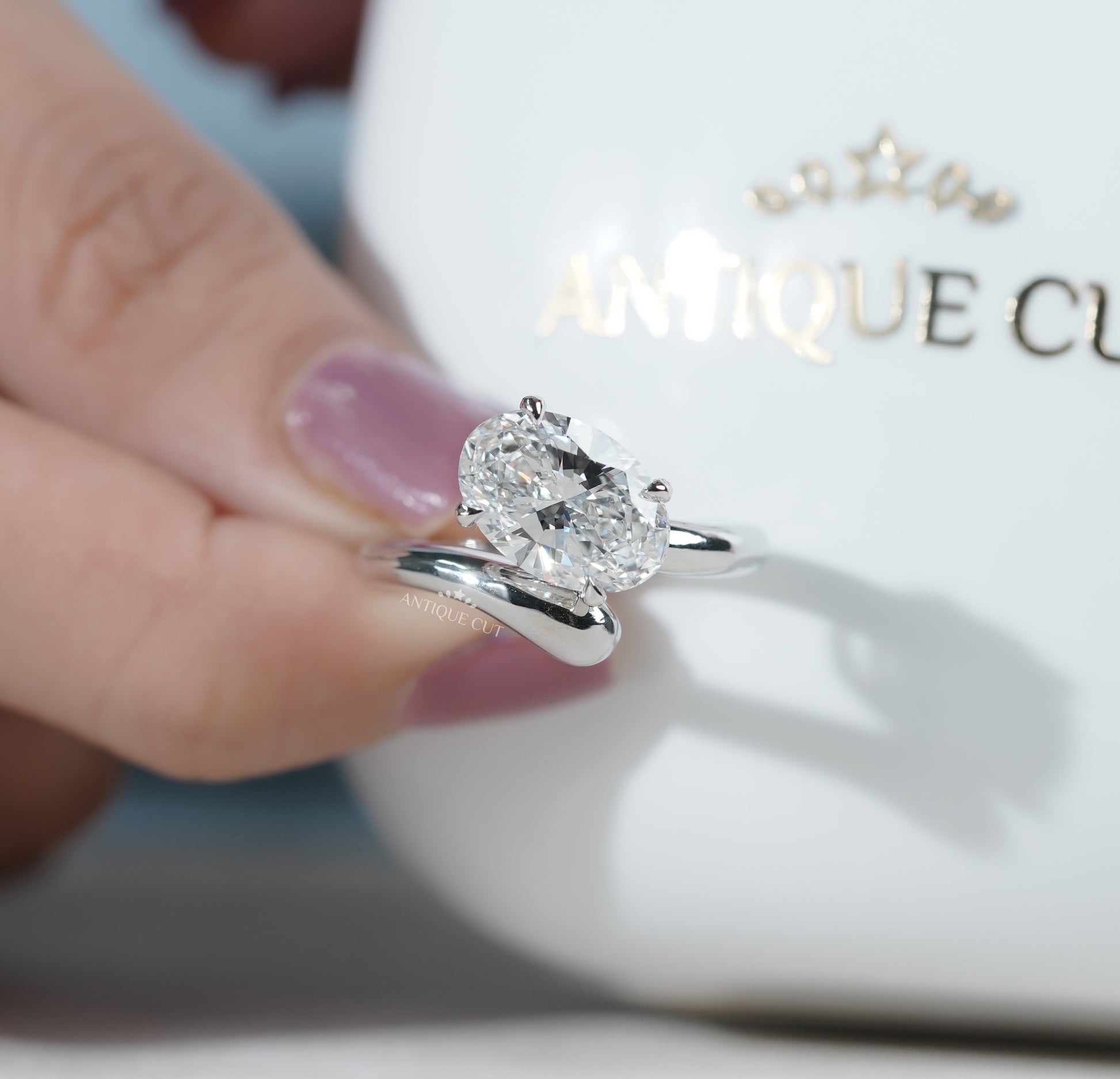 Oval Cut Engagement Ring with Bypass Setting