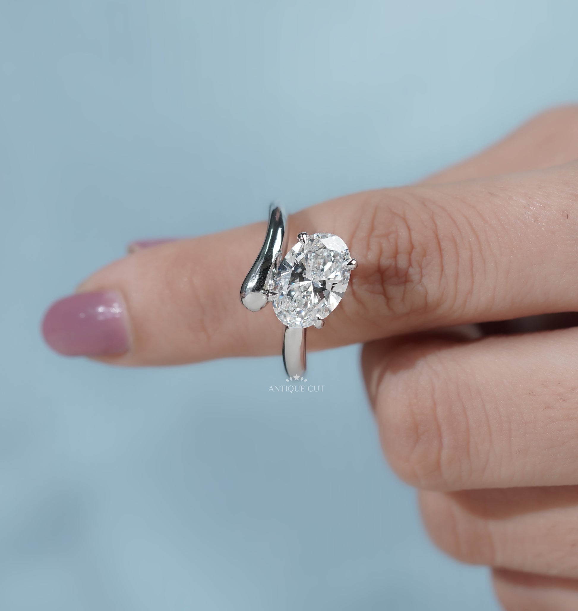 Oval Cut Engagement Ring with Bypass Setting