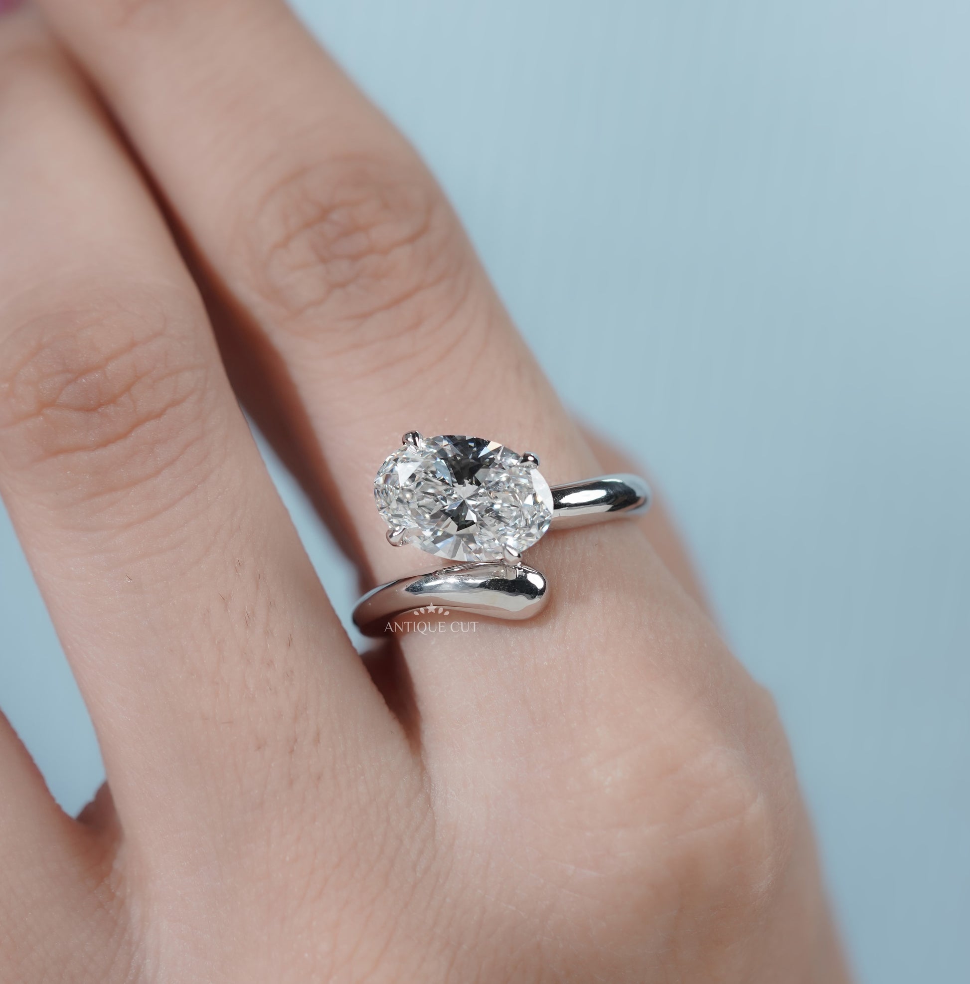 Oval Cut Engagement Ring with Bypass Setting
