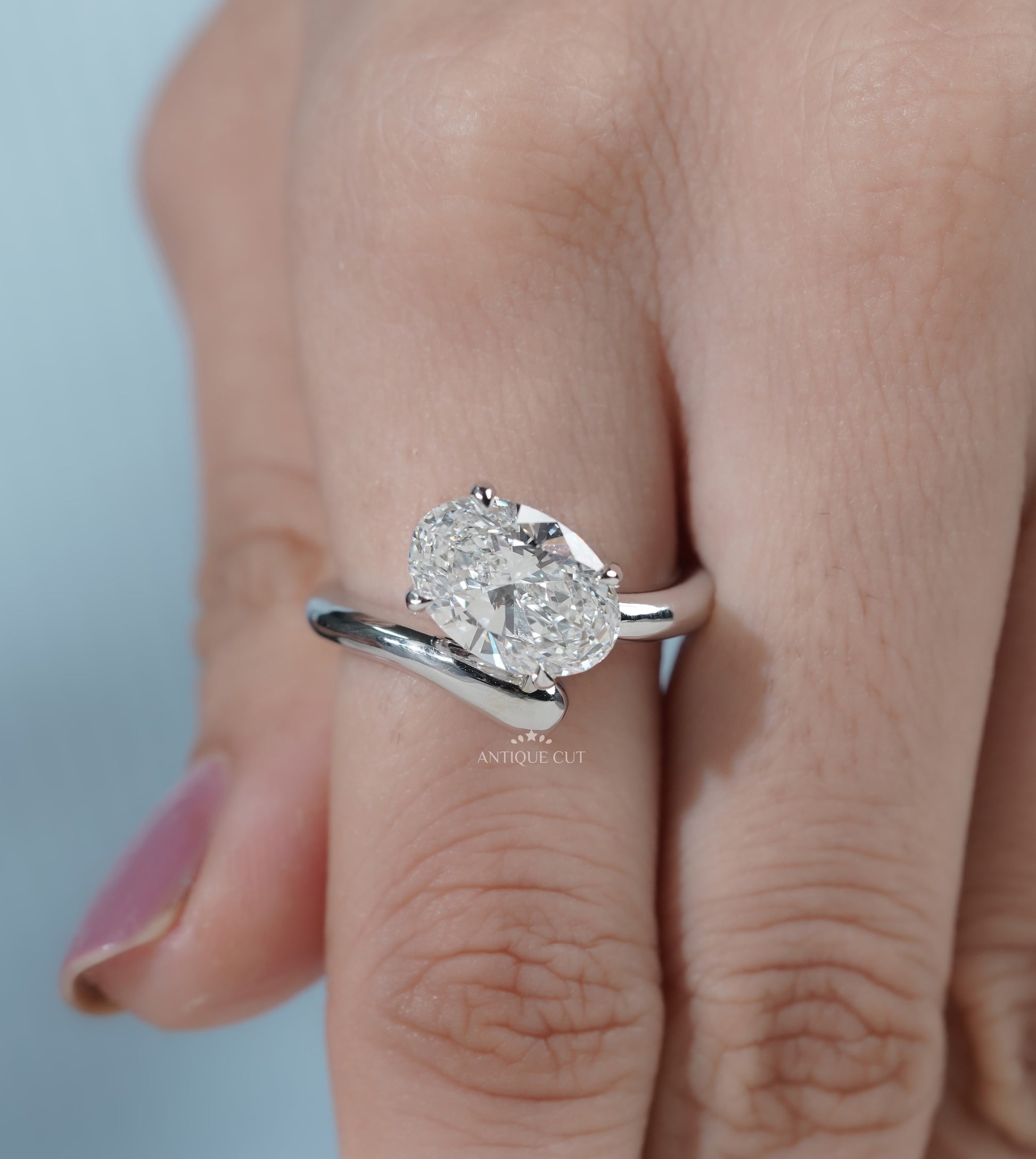 Oval Cut Engagement Ring with Bypass Setting