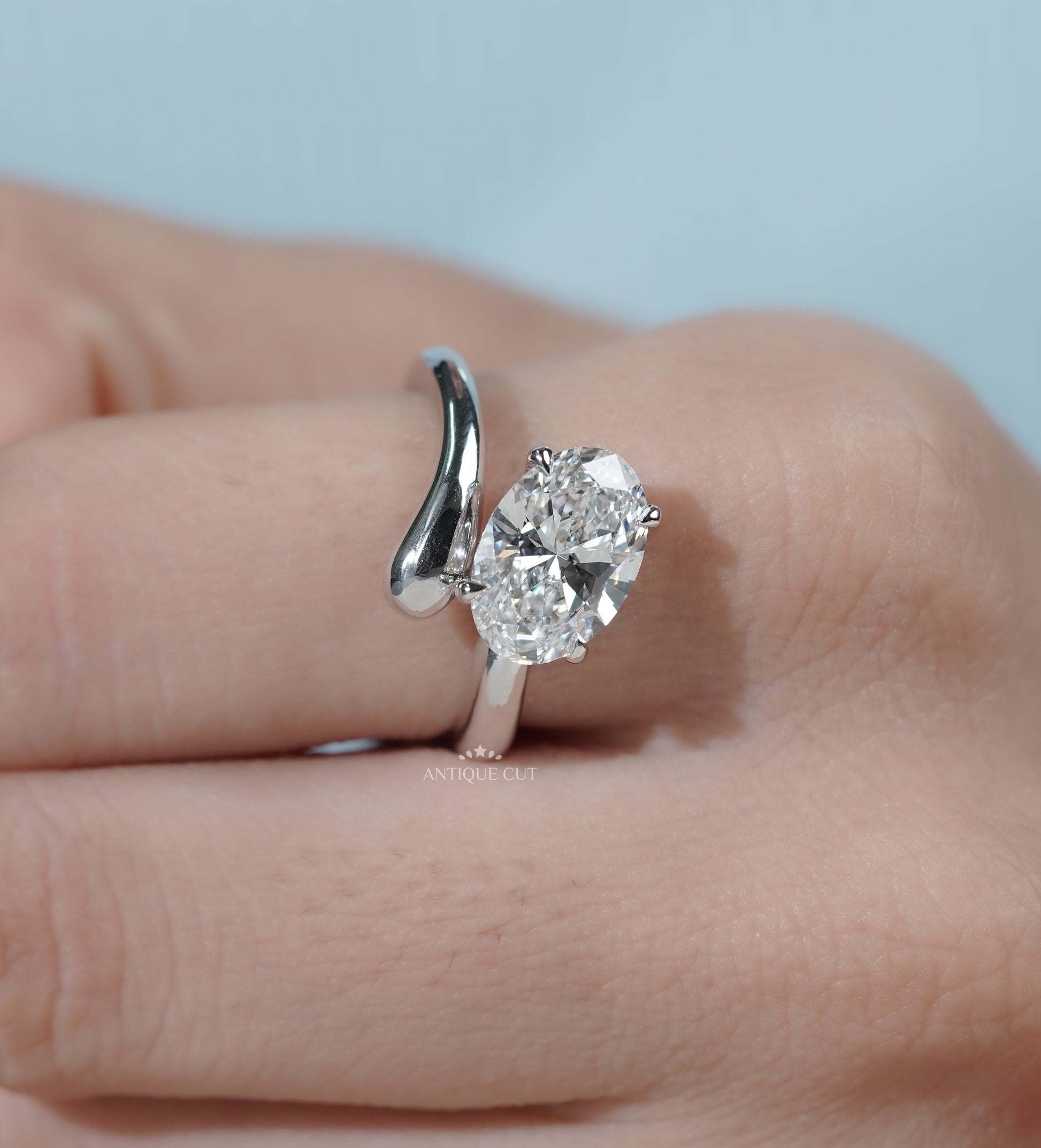 Oval Cut Engagement Ring with Bypass Setting