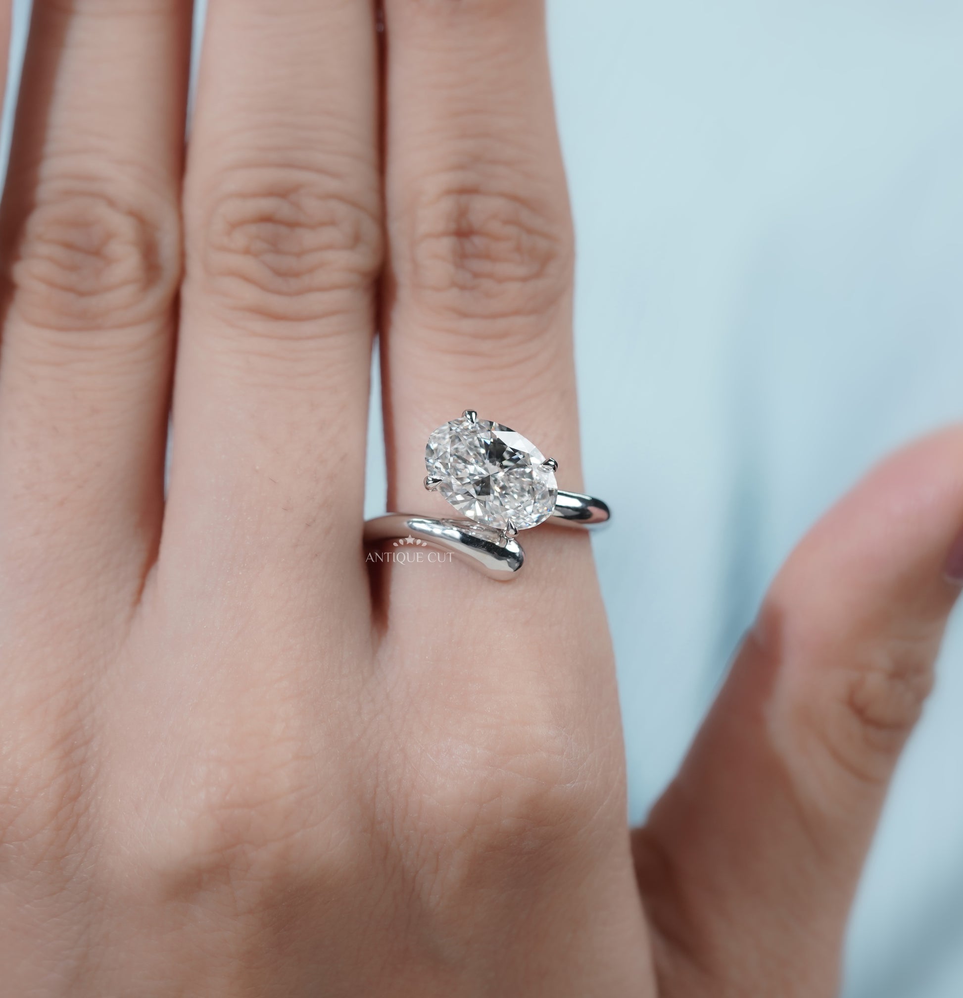 Oval Cut Engagement Ring with Bypass Setting