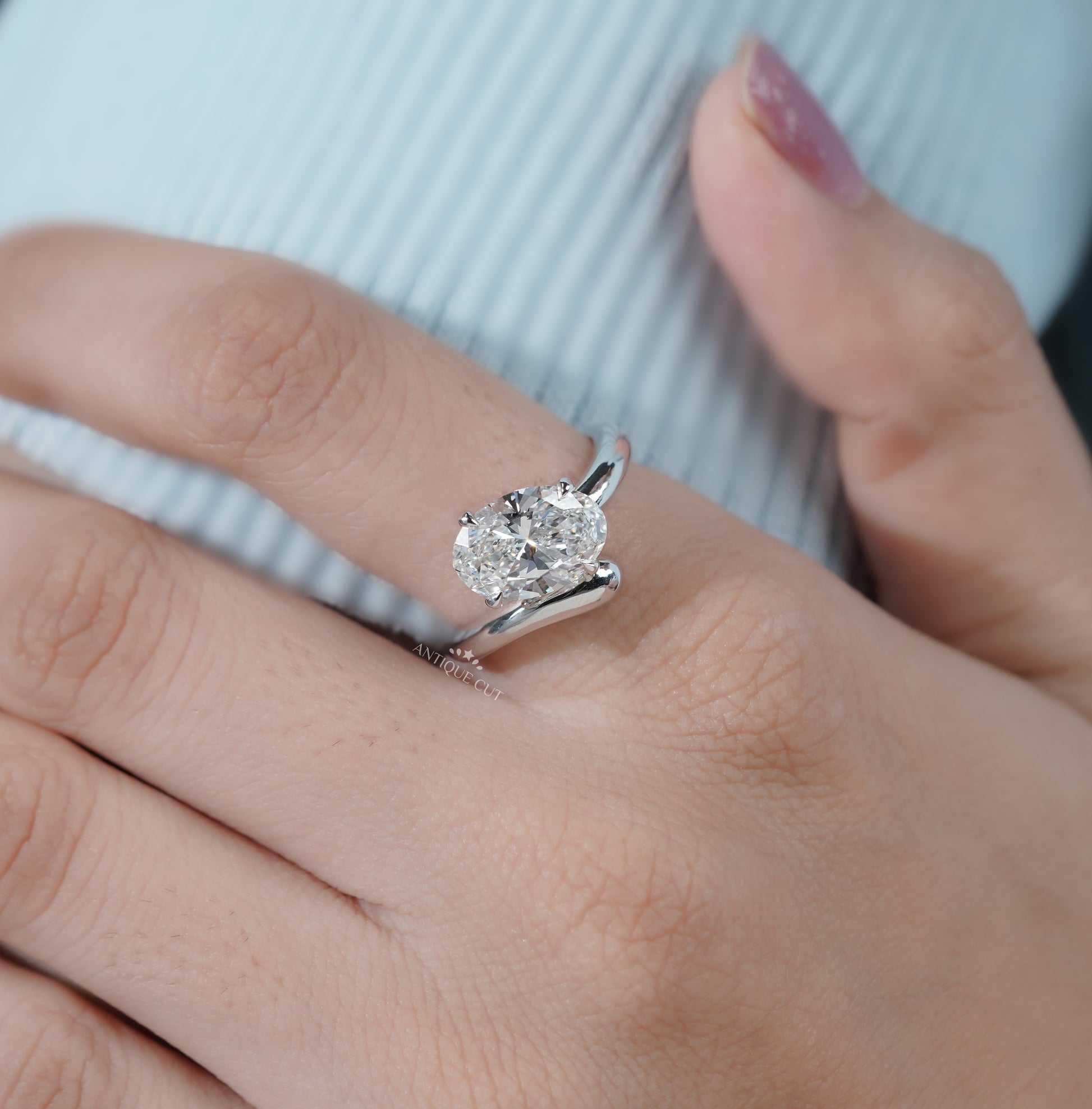 Oval Cut Engagement Ring with Bypass Setting