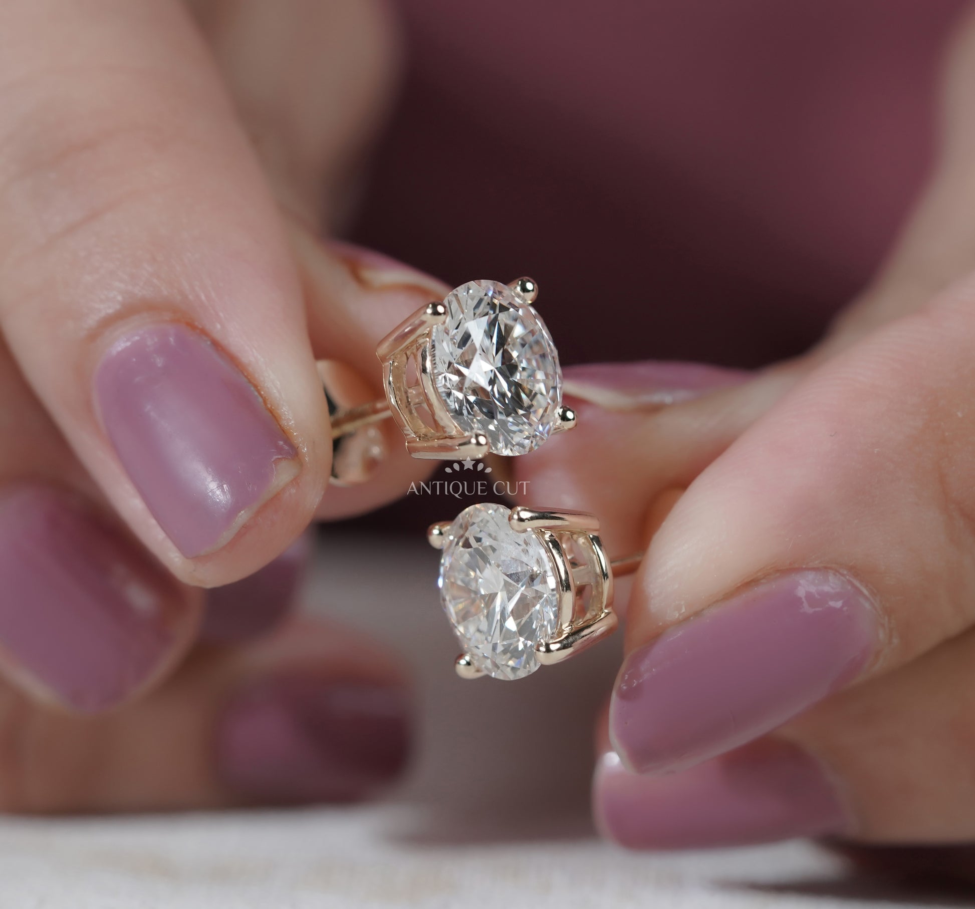Round Cut Diamond Stud Earrings in Yellow Gold