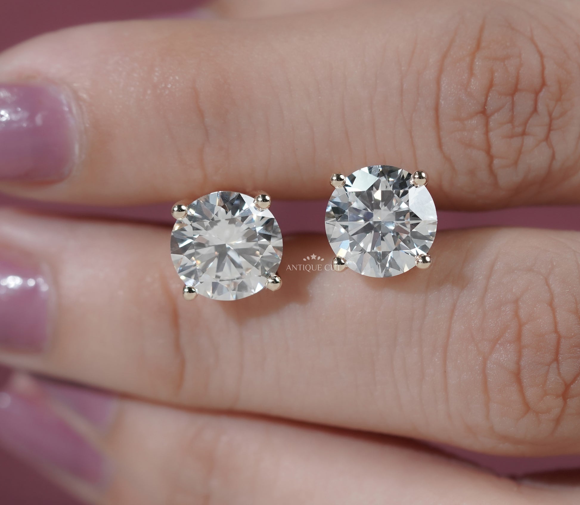 Round Cut Diamond Stud Earrings in Yellow Gold