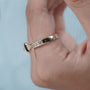 Minimalist cushion cut diamond ring with half bezel setting