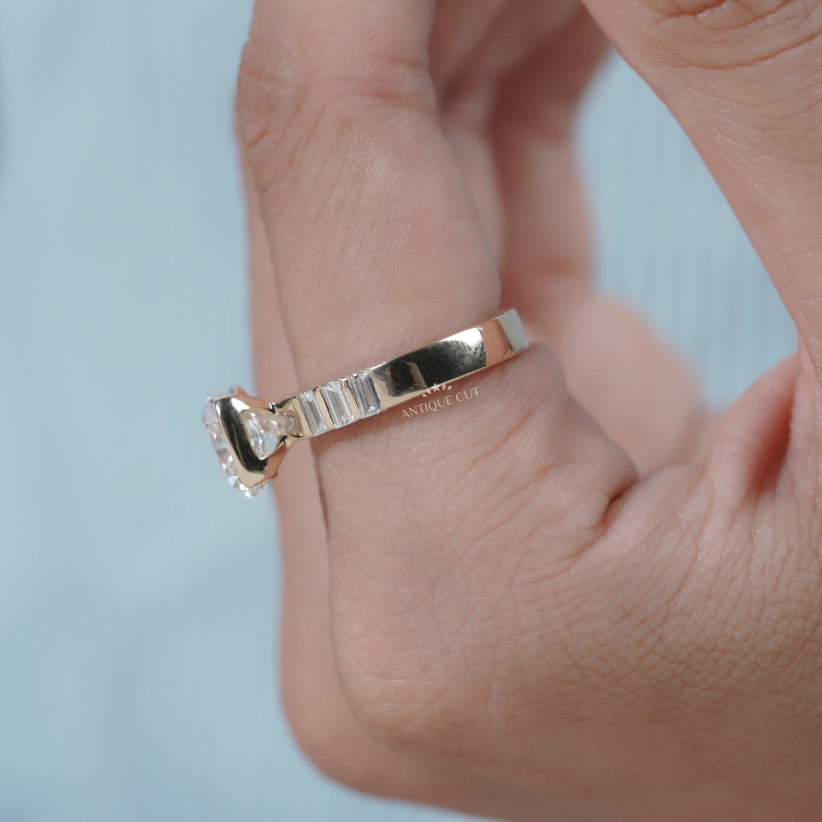 Minimalist cushion cut diamond ring with half bezel setting