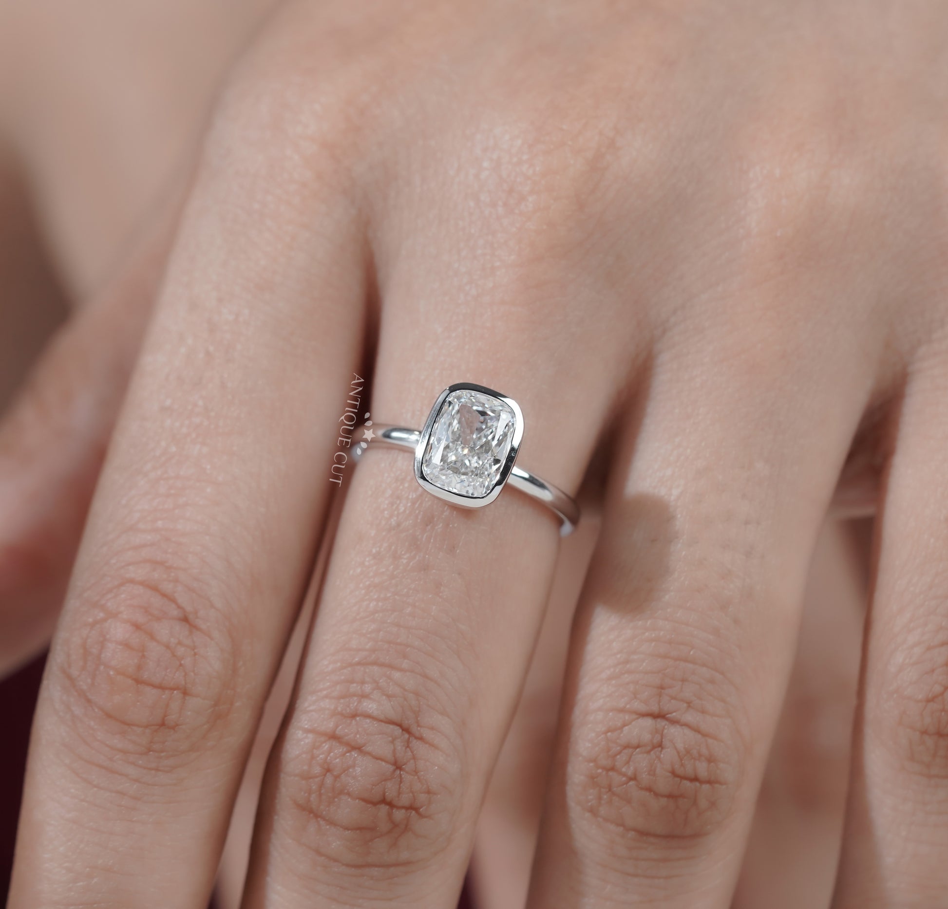 Cushion Cut Solitaire Engagement Ring with Bezel Setting
