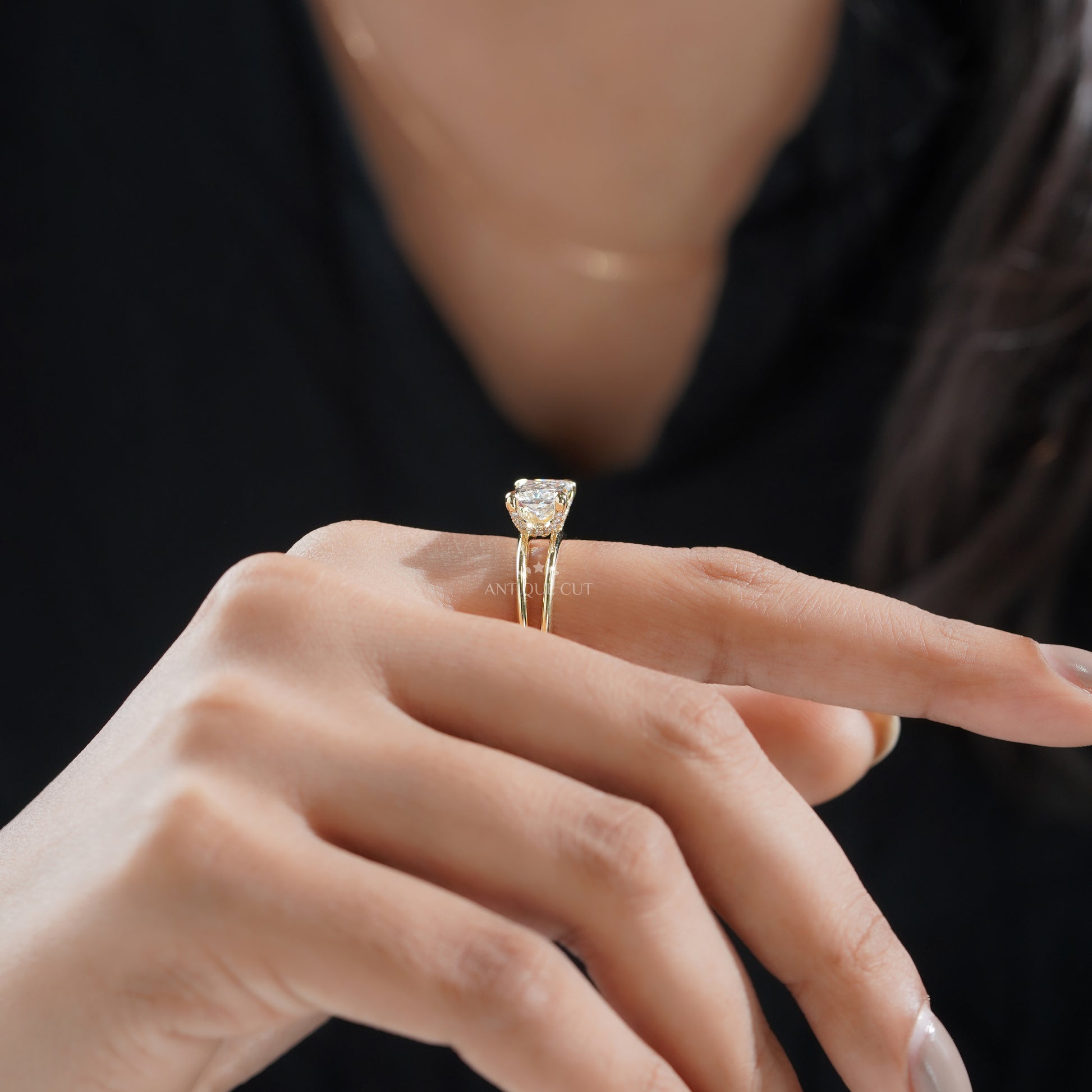IGI certified yellow gold east west radiant diamond ring