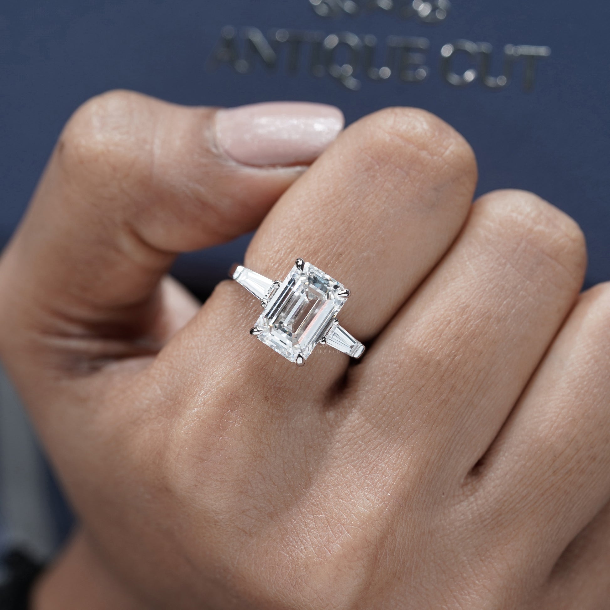 Emerald Cut 5.60tcw Lab Grown Diamond Three Stone Engagement Ring | Baguette Side Stones | Platinum/White Gold | IGI Certified