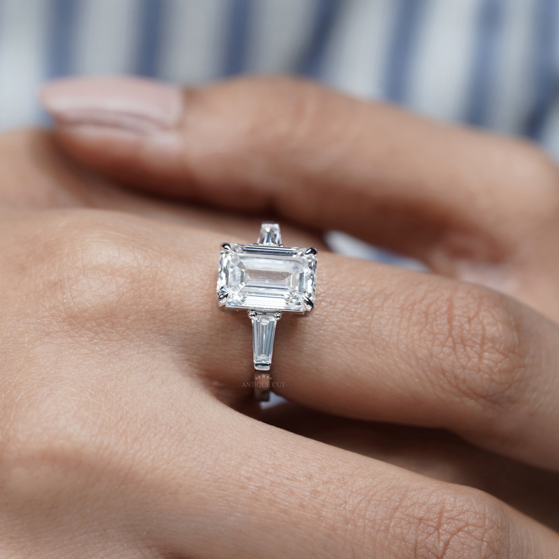 Emerald Cut 5.60tcw Lab Grown Diamond Three Stone Engagement Ring | Baguette Side Stones | Platinum/White Gold | IGI Certified