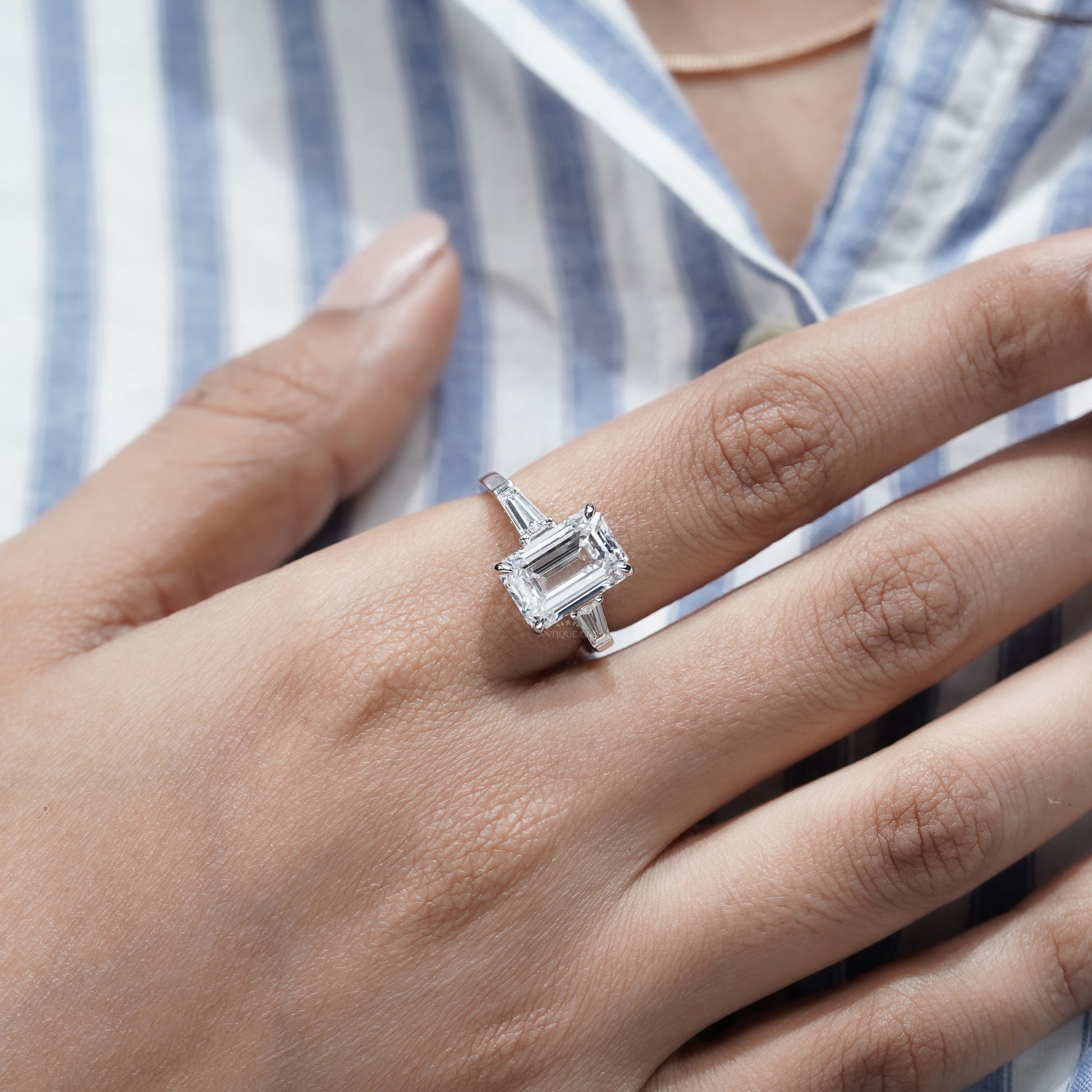 Emerald Cut 5.60tcw Lab Grown Diamond Three Stone Engagement Ring | Baguette Side Stones | Platinum/White Gold | IGI Certified