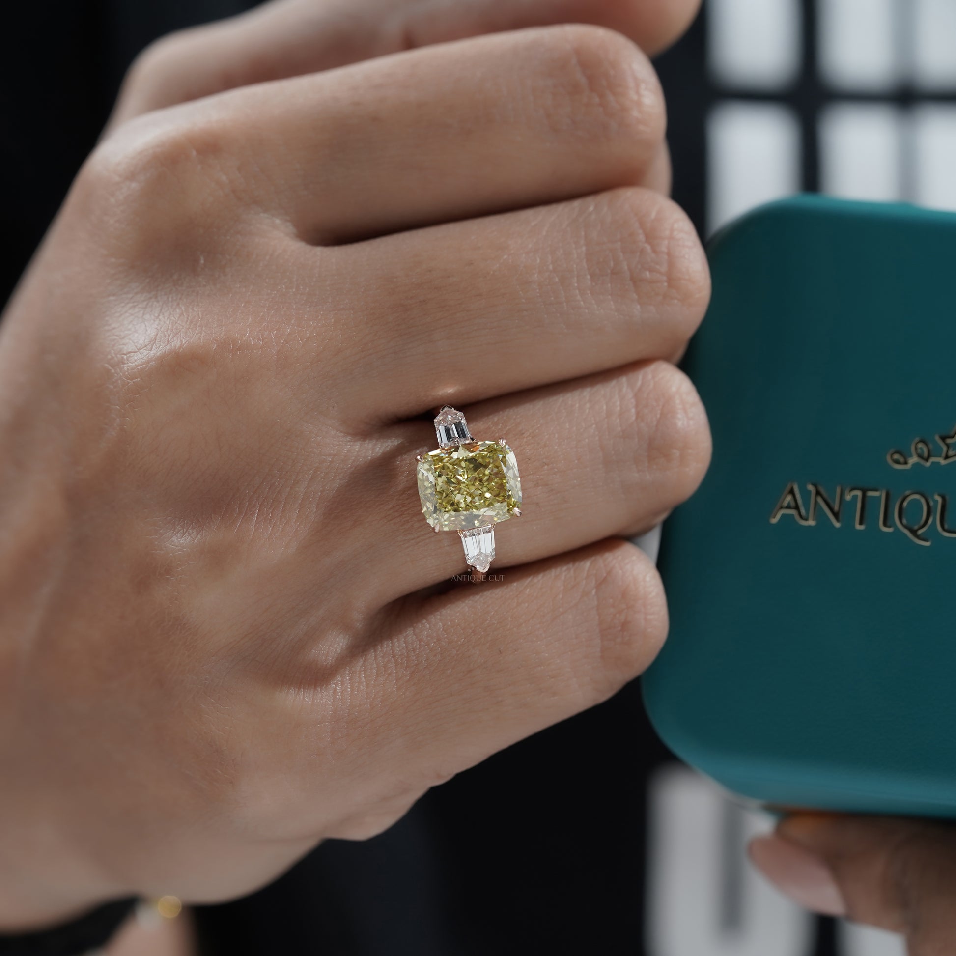 Fancy Yellow 6.50tcw Cushion Cut Lab Diamond Ring | Rose Gold Three-Stone | IGI Certified