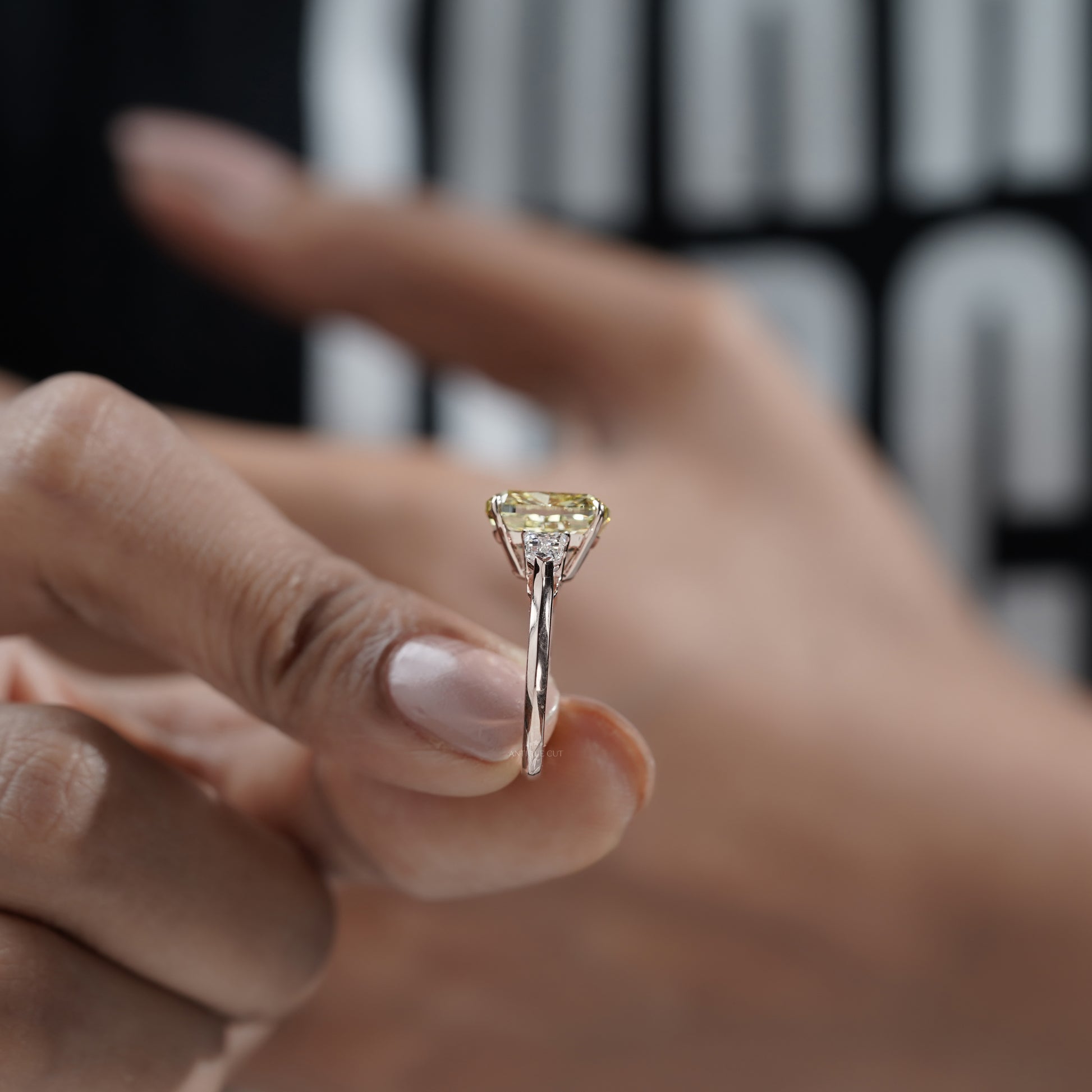 Fancy Yellow 6.50tcw Cushion Cut Lab Diamond Ring | Rose Gold Three-Stone | IGI Certified