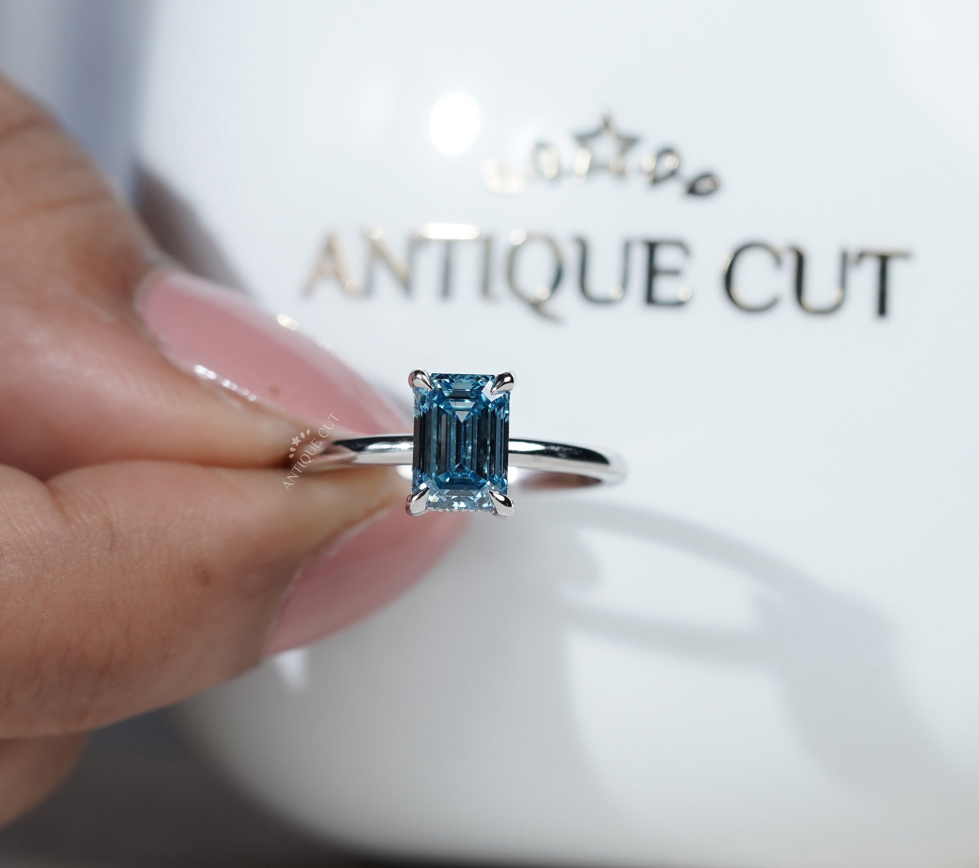 Lab Grown Blue Diamond Emerald Cut Engagement Ring