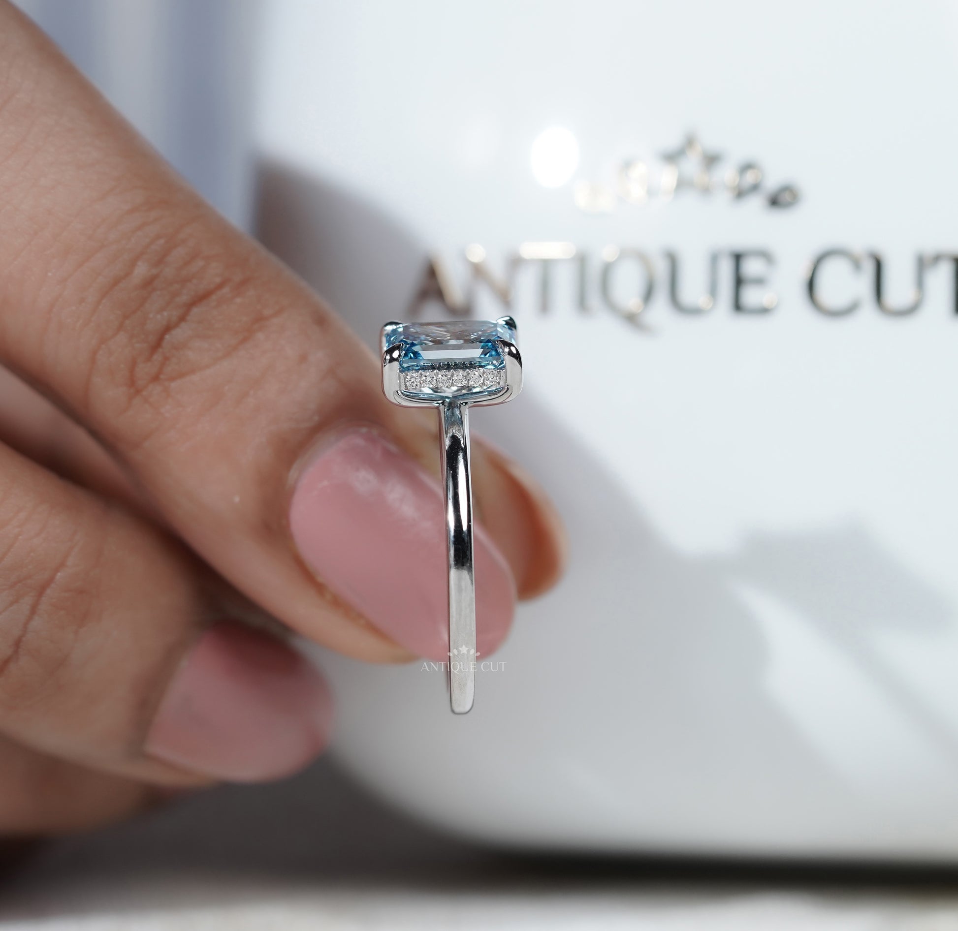 Lab Grown Blue Diamond Emerald Cut Engagement Ring