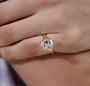 Radiant cut solitaire engagement ring with wide yellow gold band