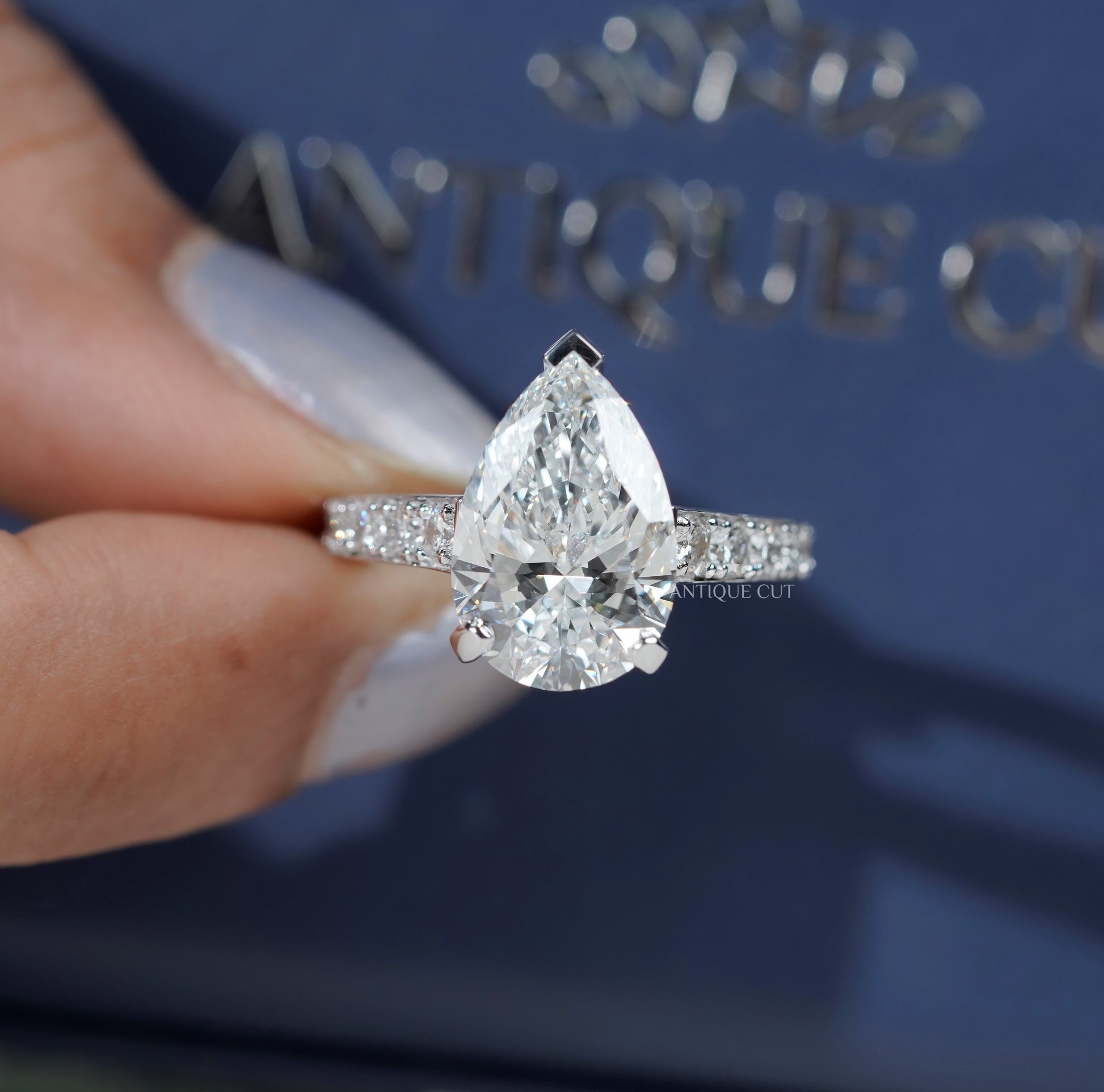 Pear Shaped Engagement Ring with Pave Band